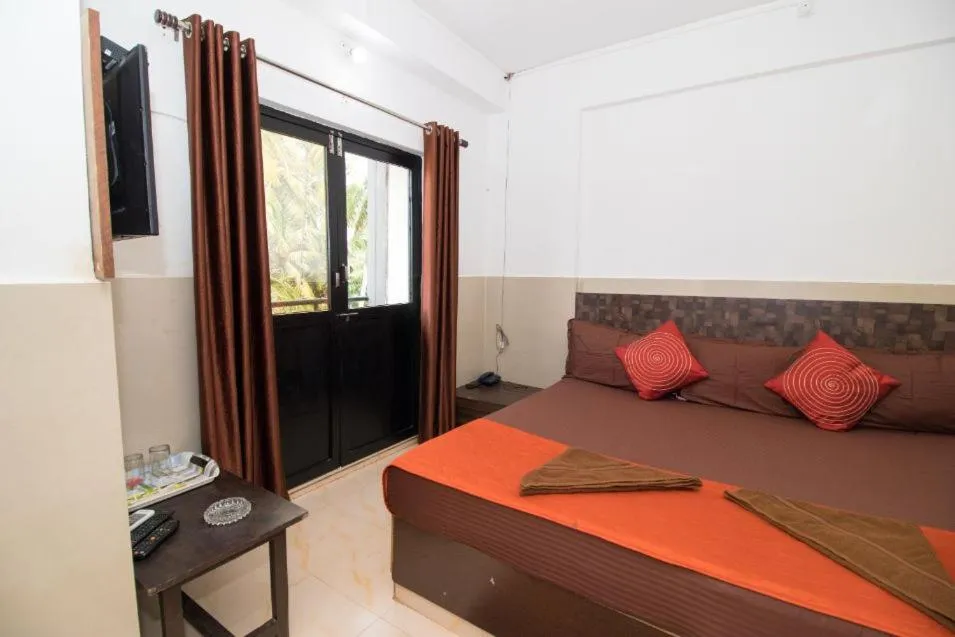 Bed in Travo Suites Panjim