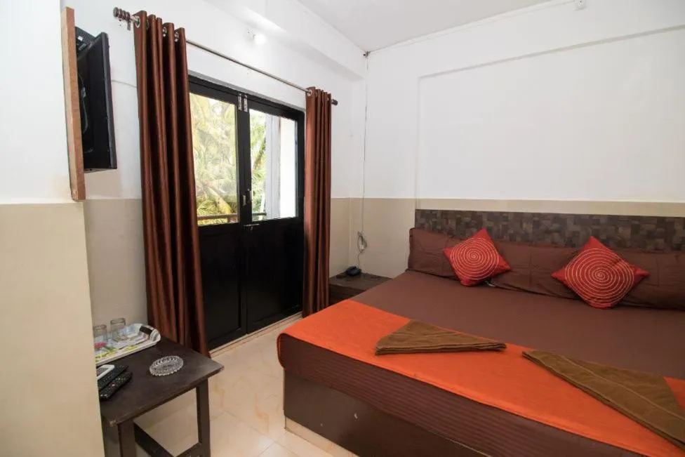 Bed in Travo Suites Panjim