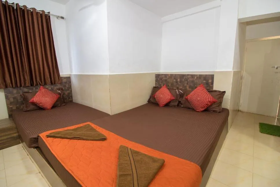 Bed in Travo Suites Panjim