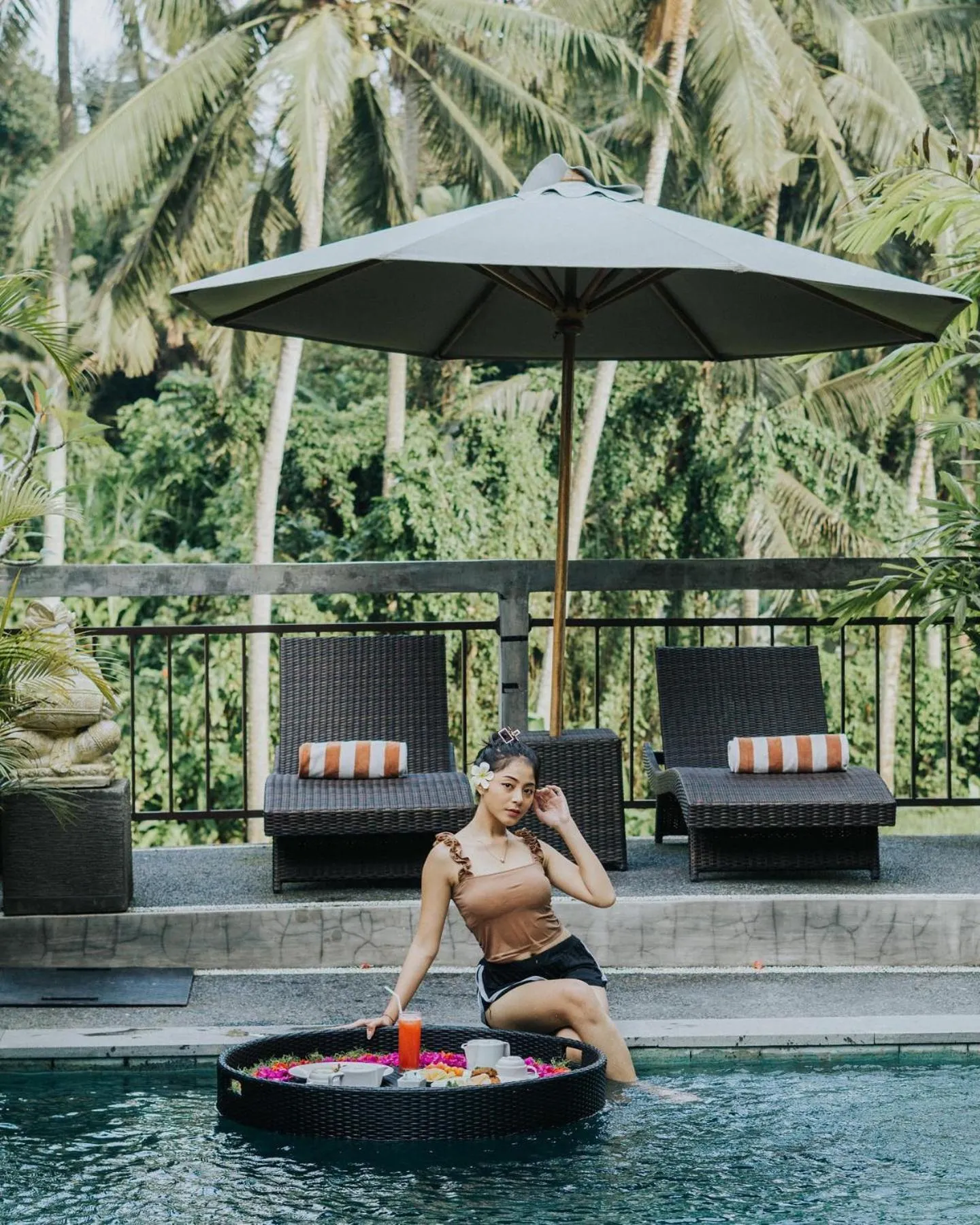 Swimming pool in Tri Dewi Residence by GenuineHost