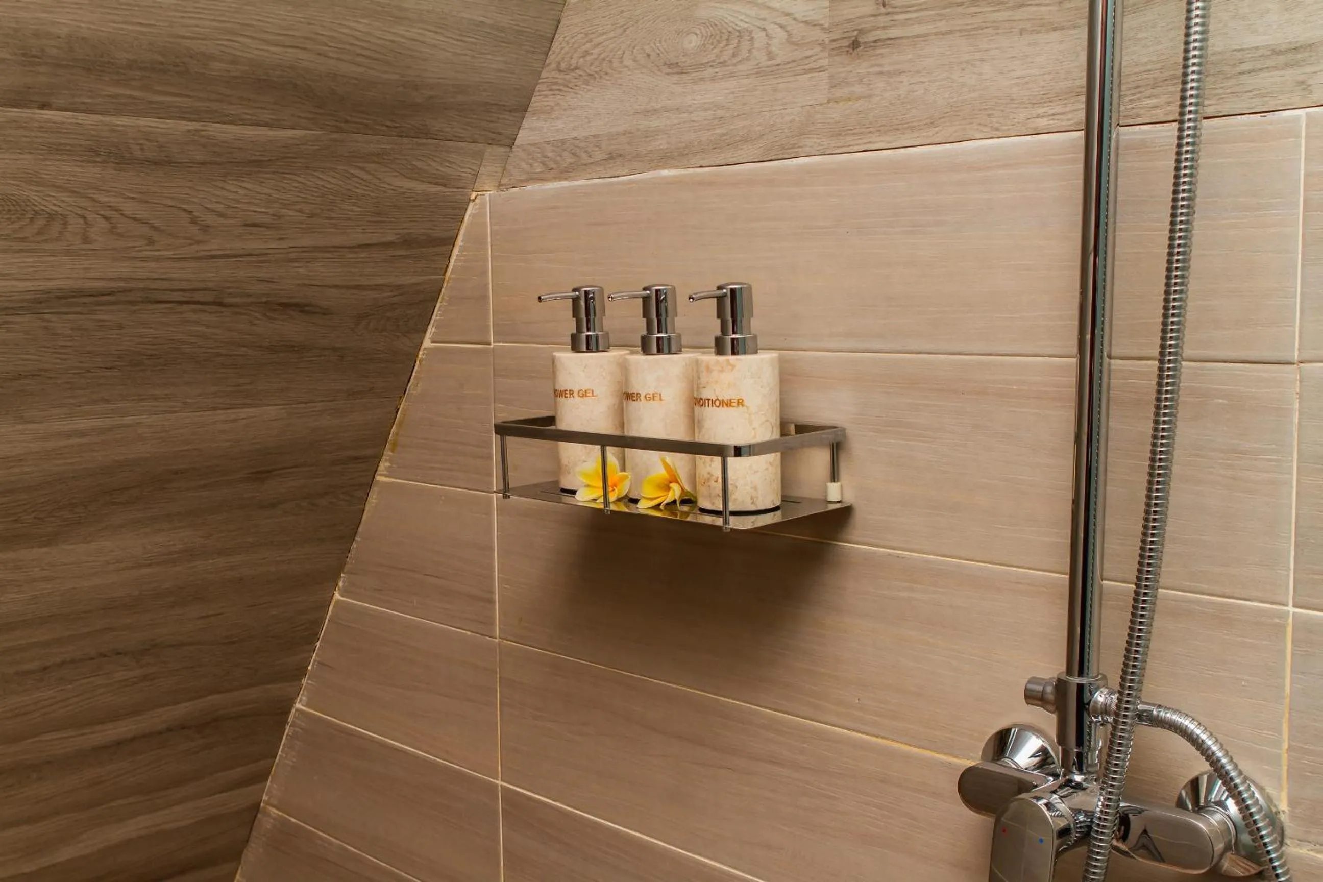 Bathroom in Tri Dewi Residence by GenuineHost