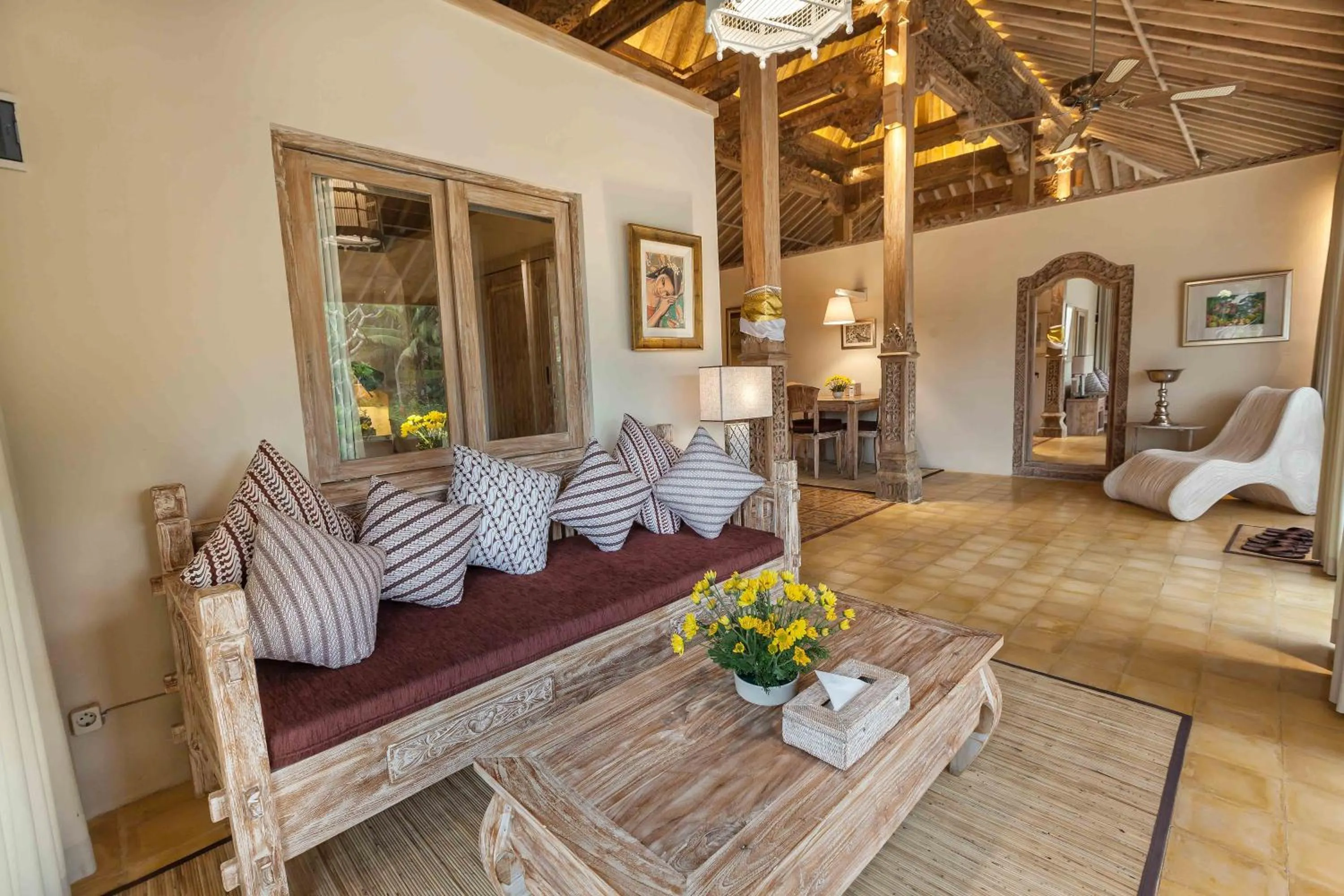 Living room in Tri Dewi Residence by GenuineHost