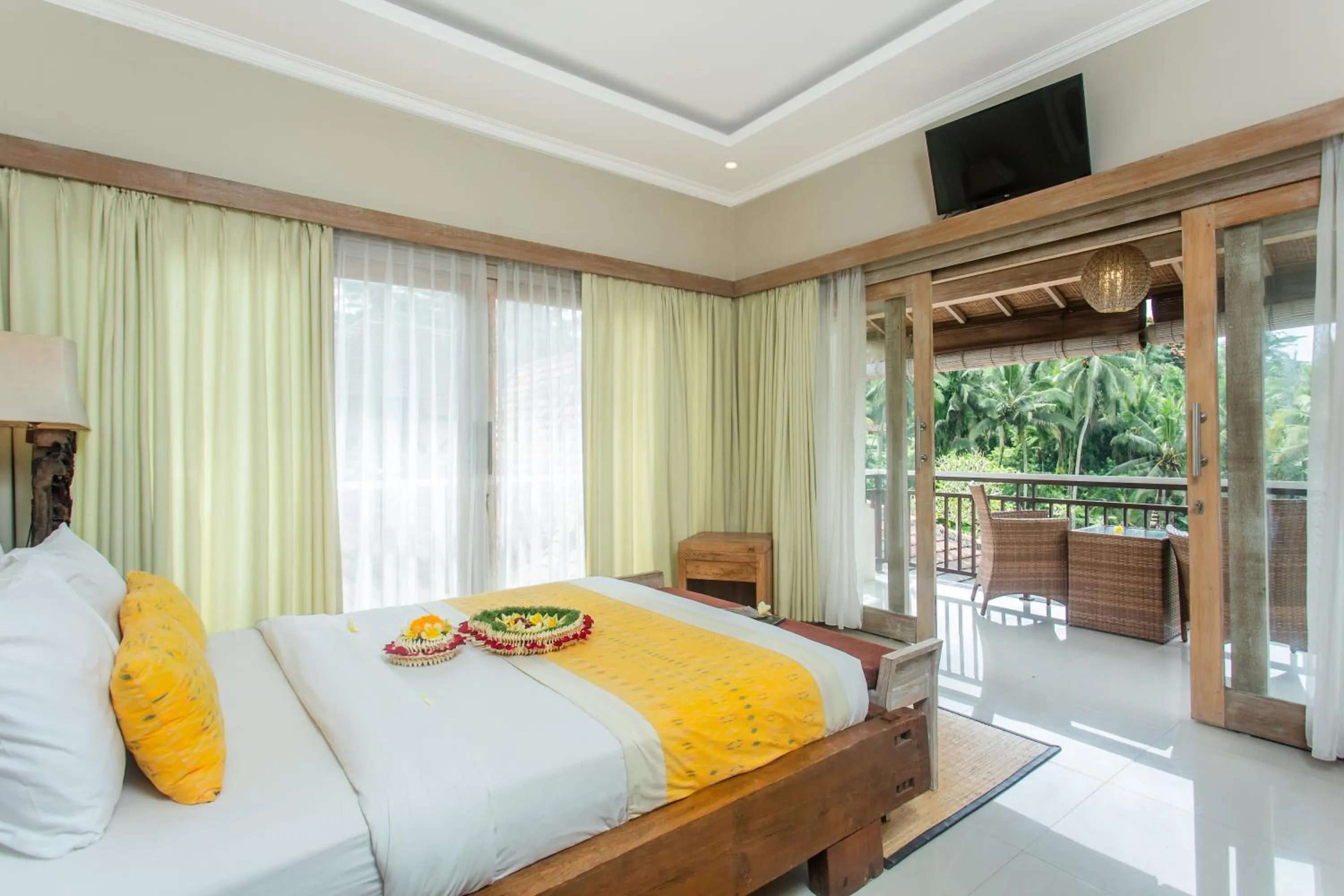 TV and multimedia, Bed in Tri Dewi Residence by GenuineHost