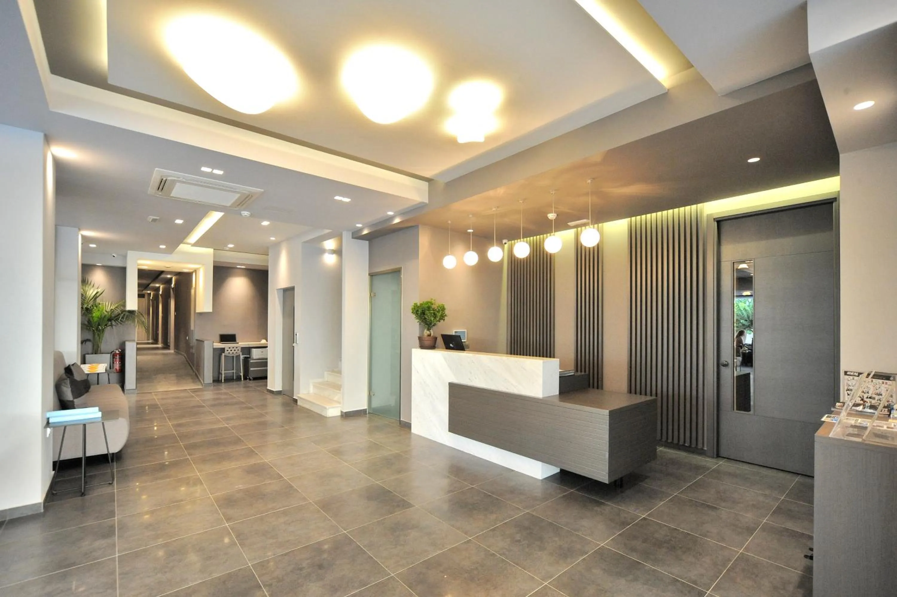 Lobby or reception in Astron Suites & Apartments