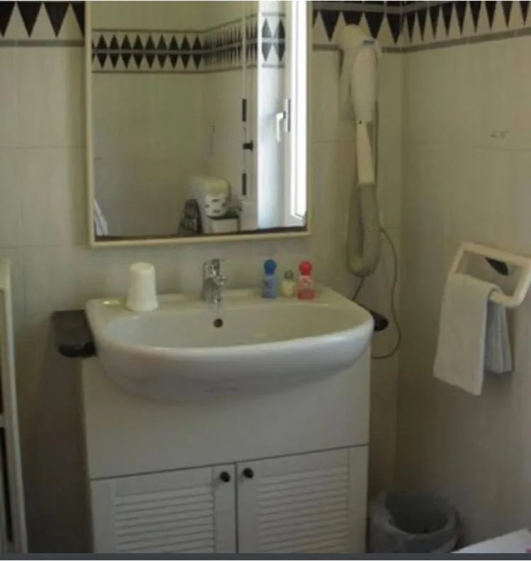 Bathroom in Residence Hotel Edy