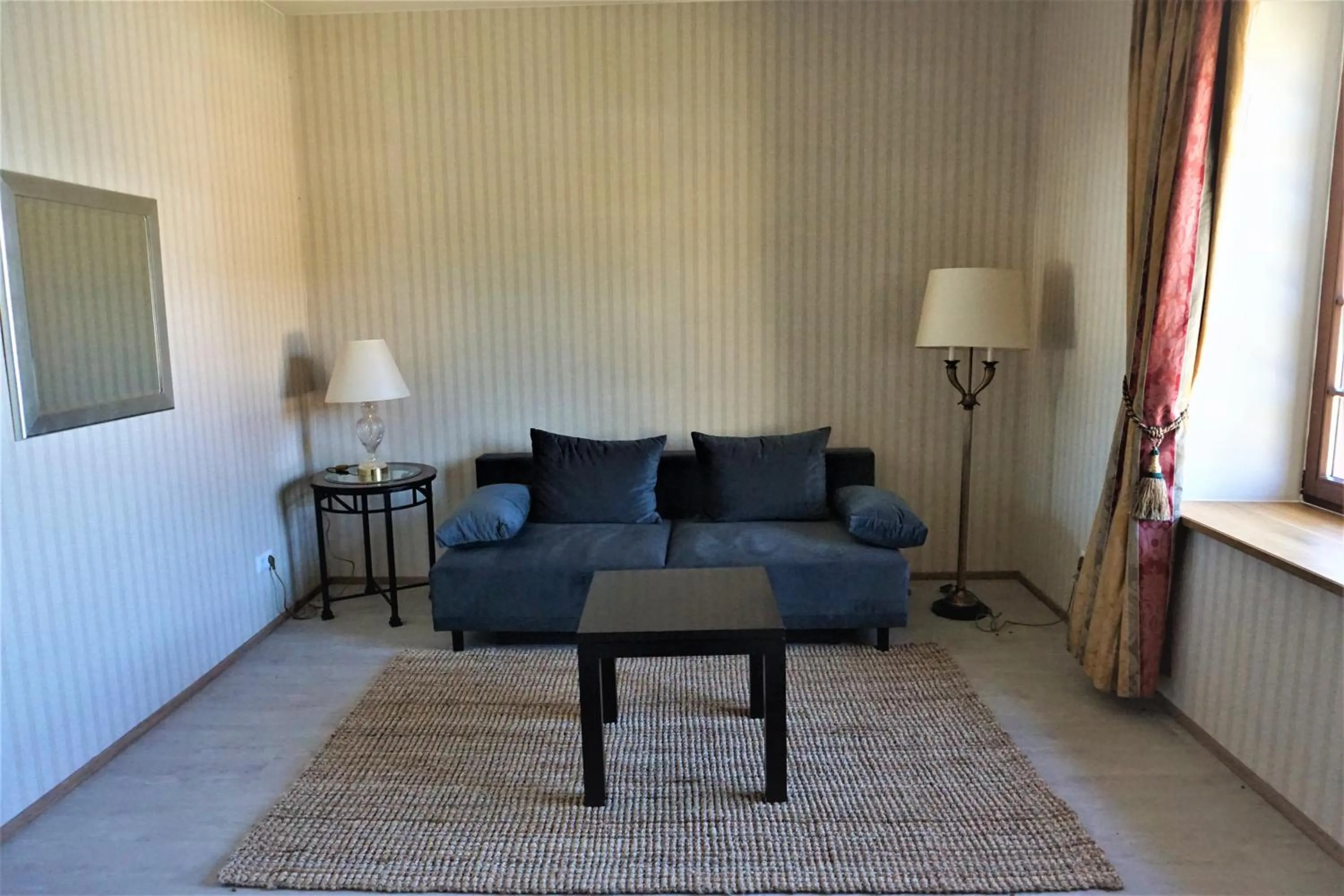 Living room in Hotel Schlossresidenz Heitzenhofen