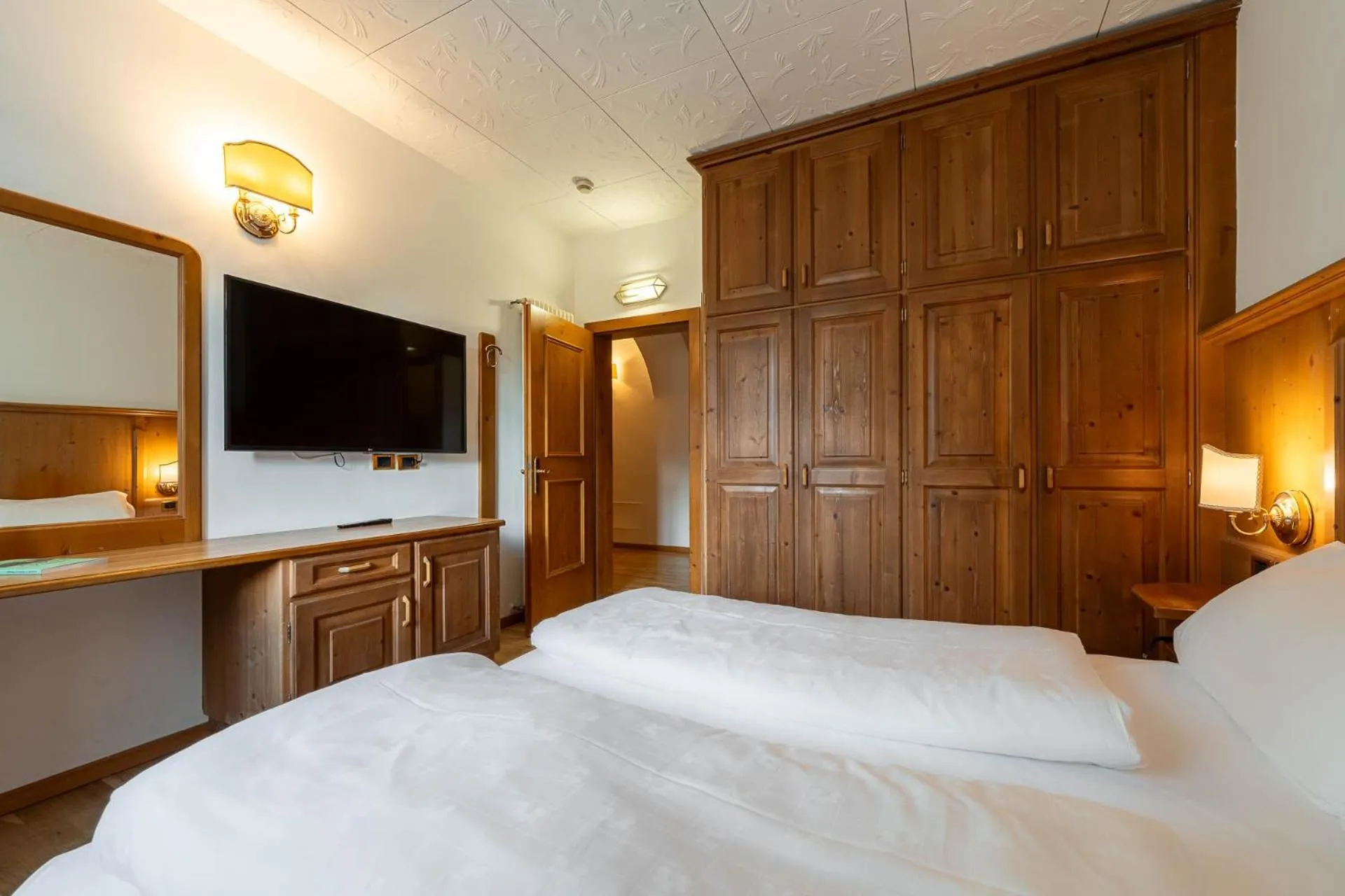 Bedroom, Bed in Hotel Dolomiti Schloss