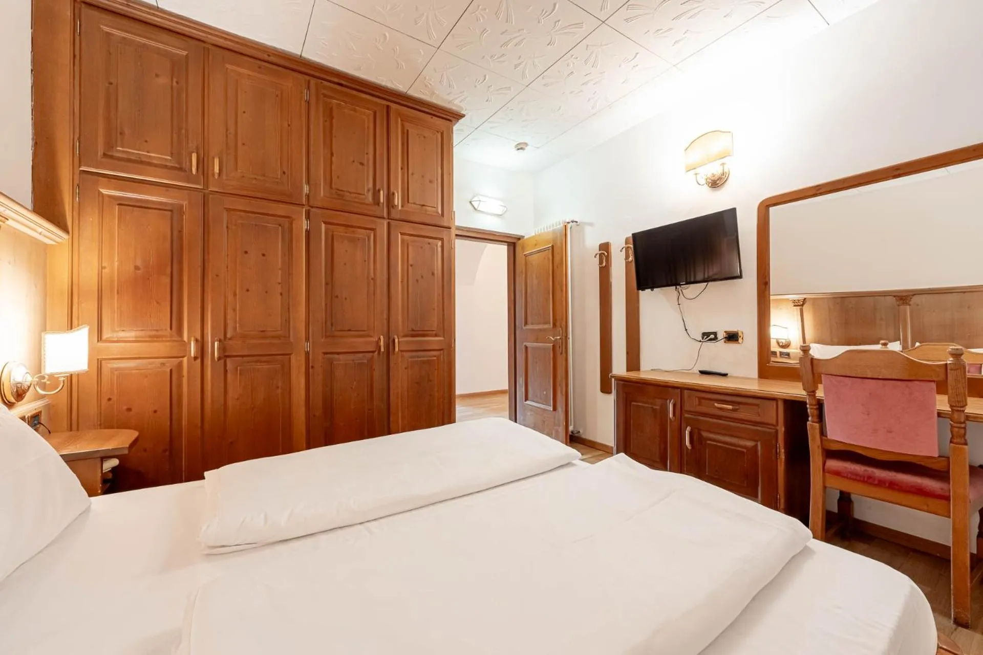 Bedroom, Bed in Hotel Dolomiti Schloss