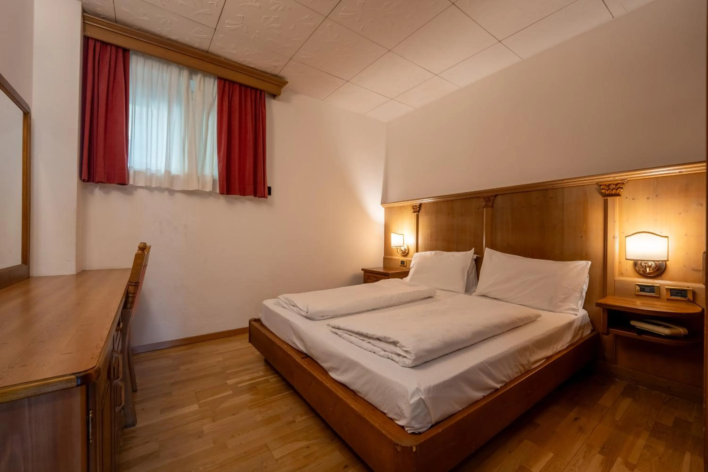 Bedroom, Bed in Hotel Dolomiti Schloss