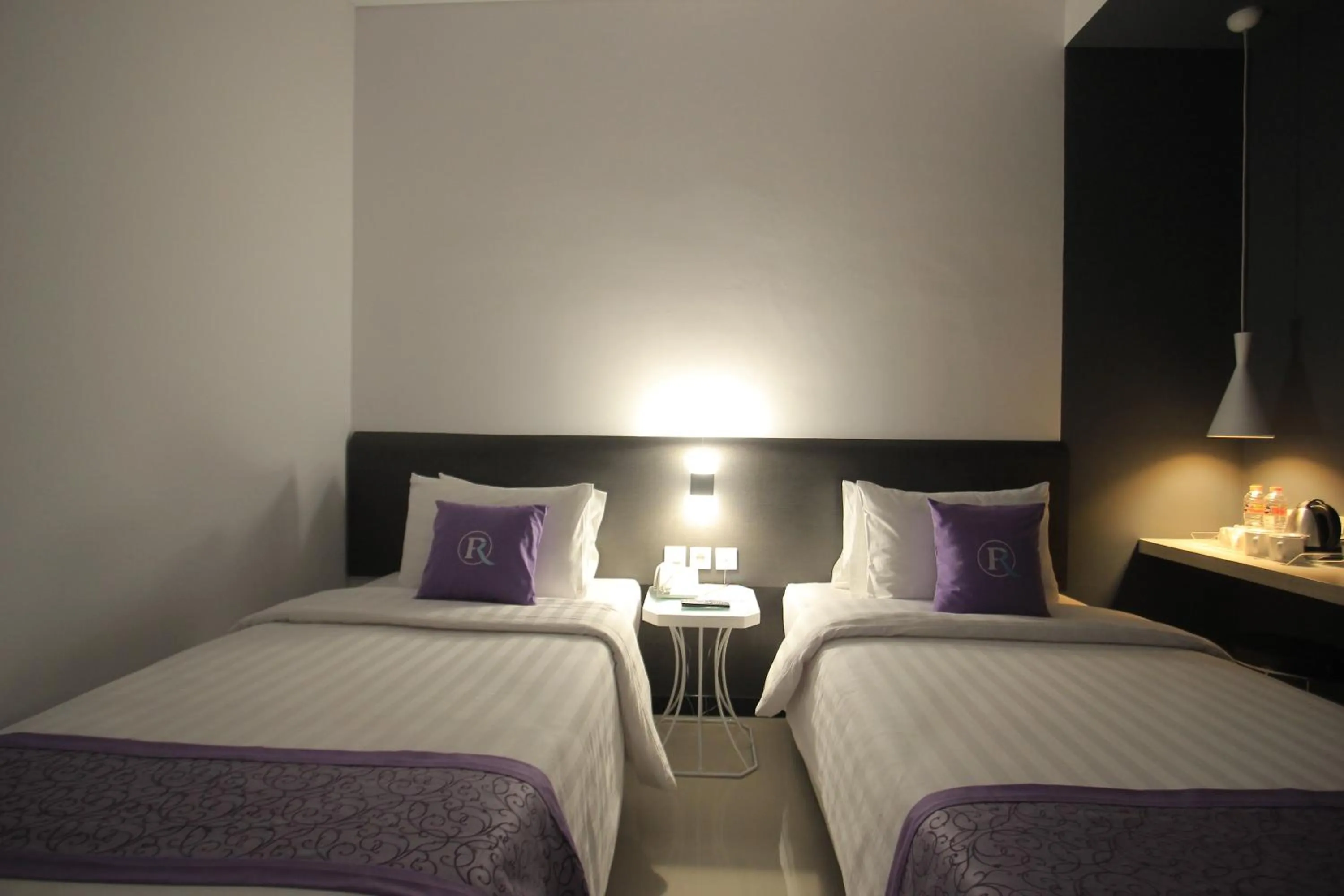 Bed in Forriz Hotel Yogyakarta