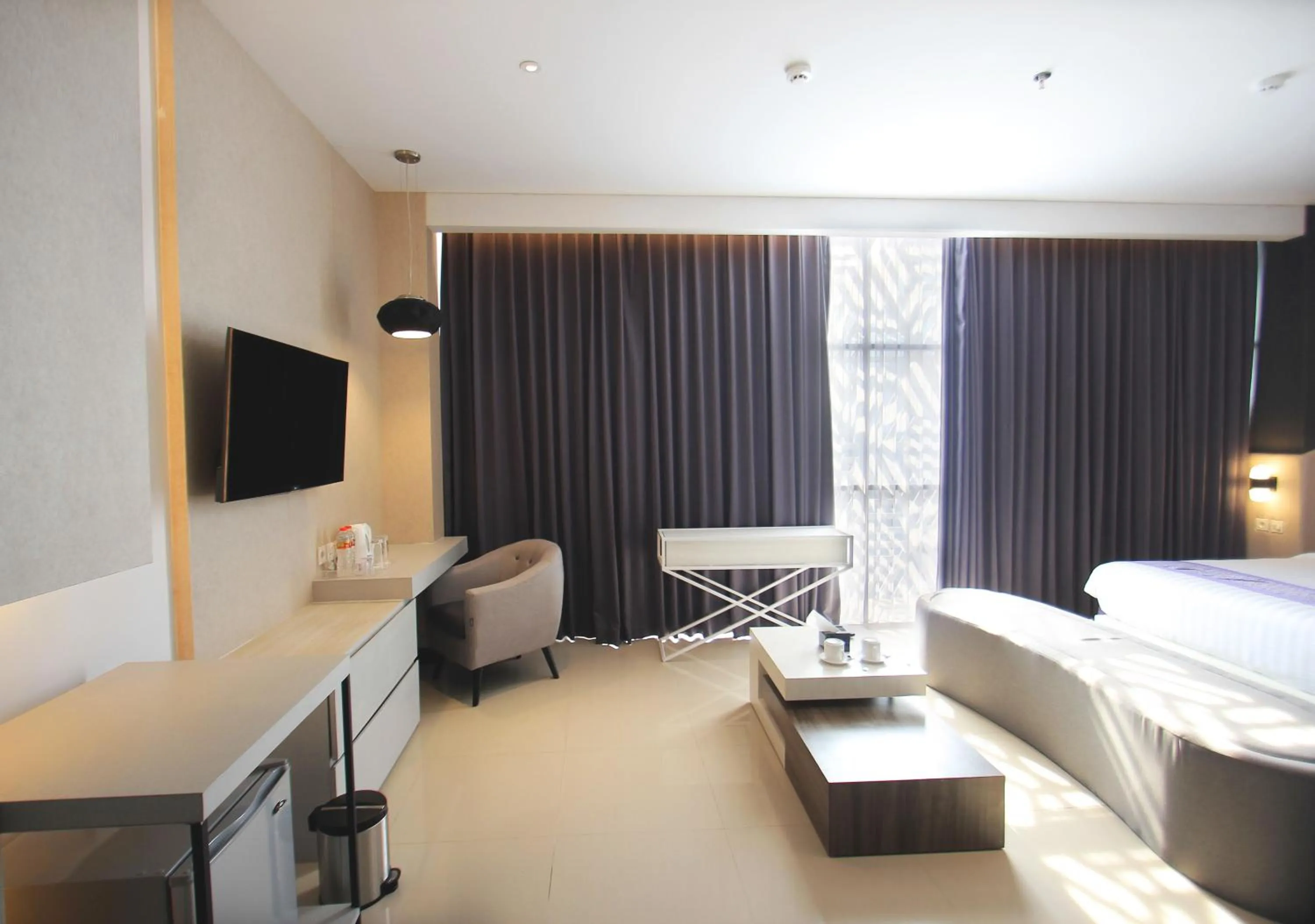 Bed in Forriz Hotel Yogyakarta