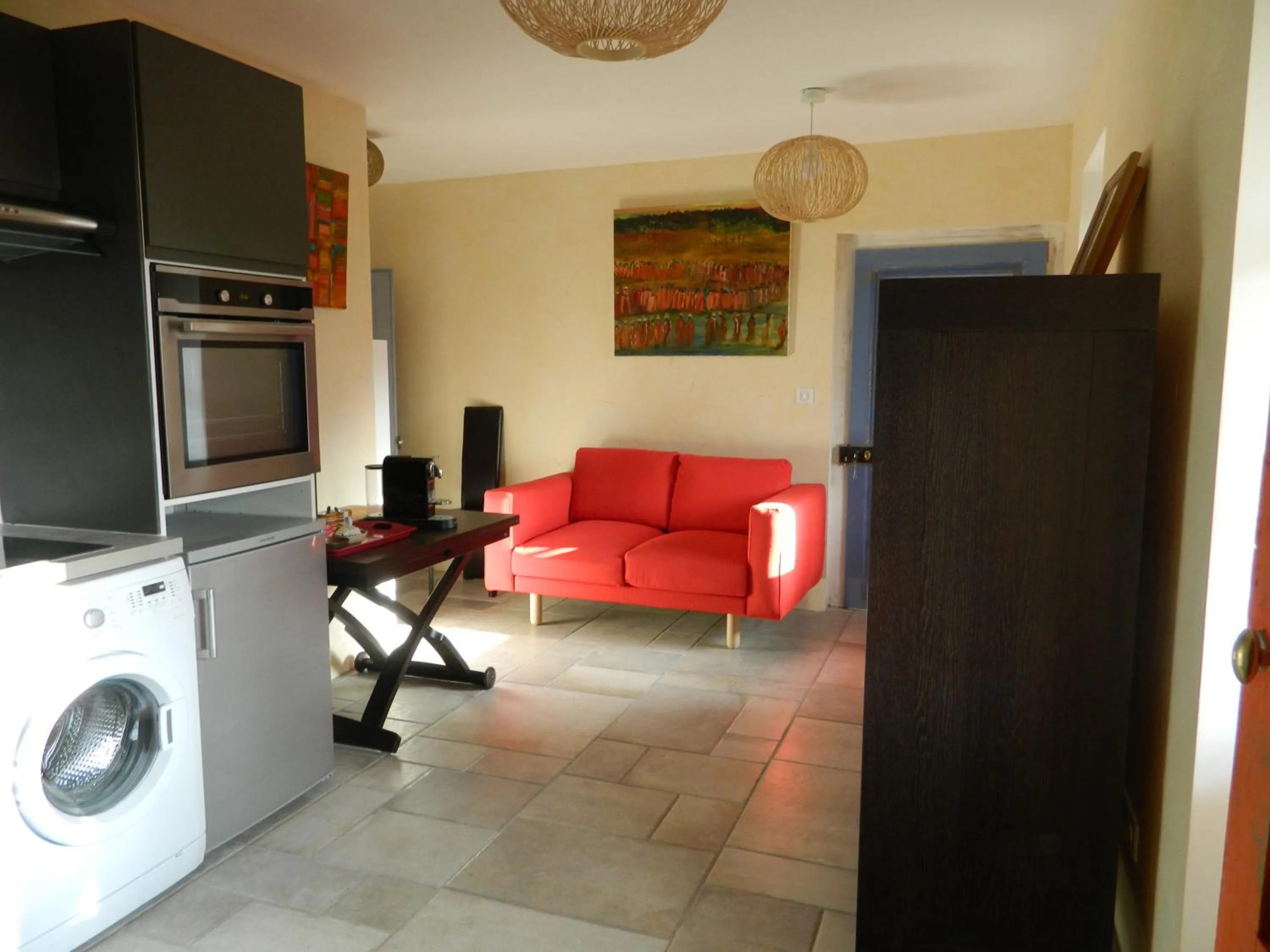 Communal lounge/ TV room in Gite de l'école