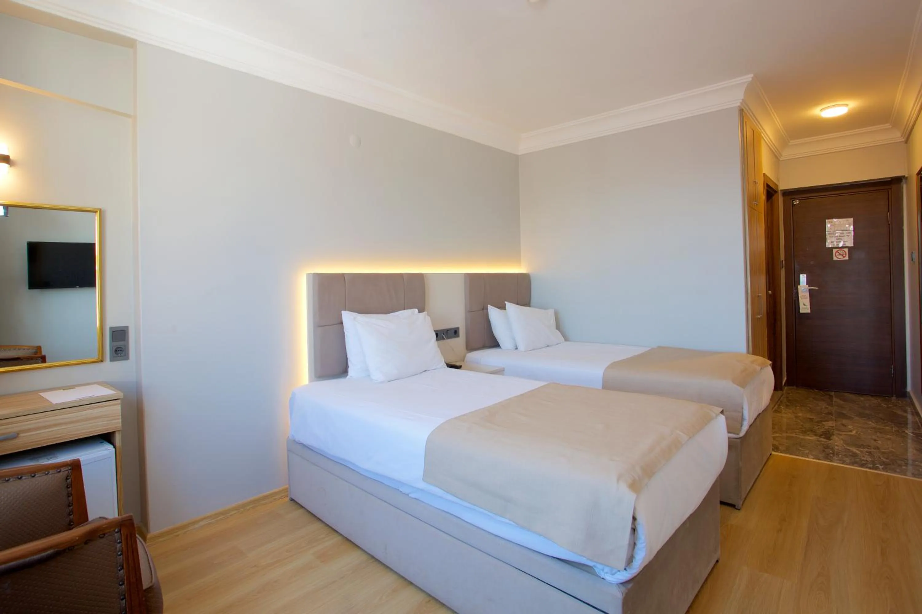 Bed in Grand Ant Hotel