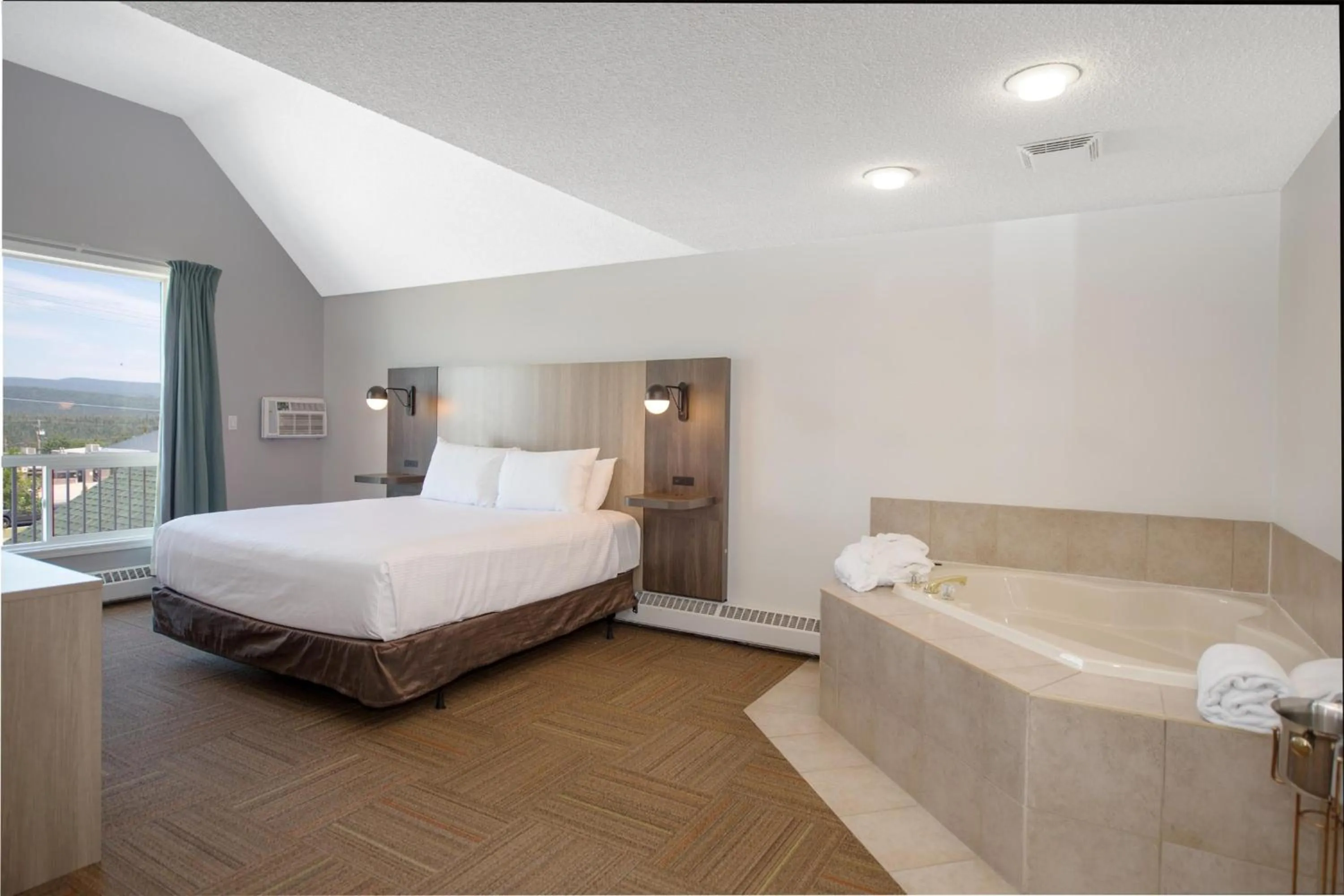 Photo of the whole room, Bed in Coast Hinton Hotel