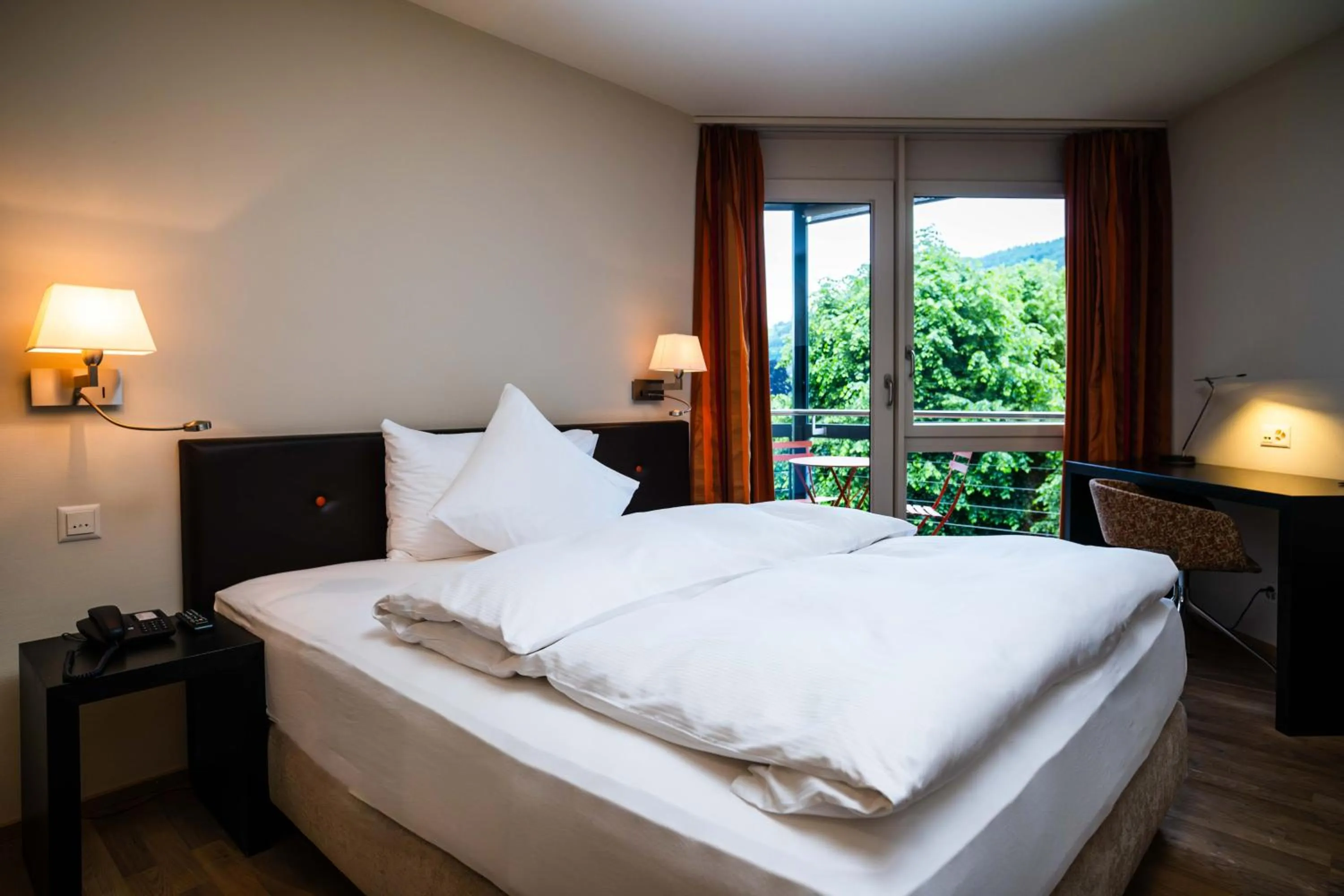 Photo of the whole room, Bed in Hotel Seepark Thun