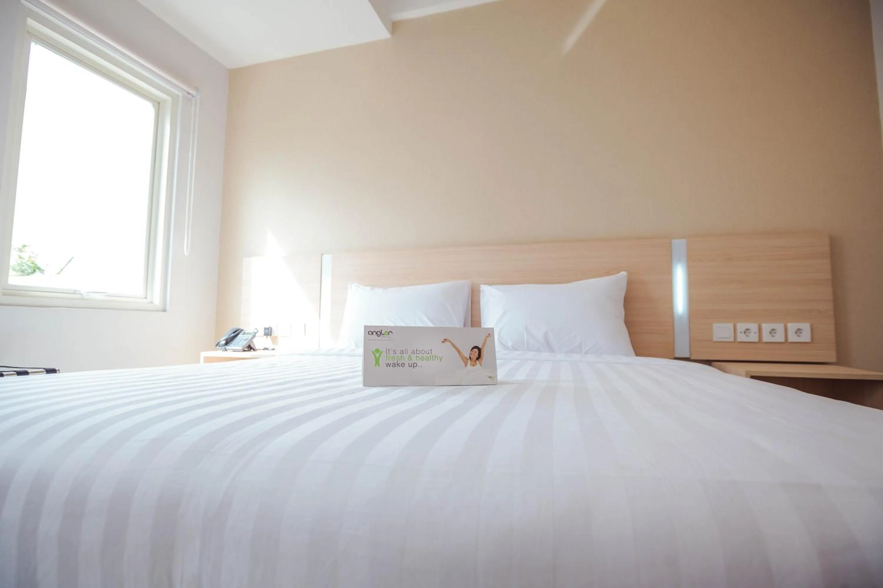 Bedroom, Bed in Whiz Prime Hotel Sudirman Makassar