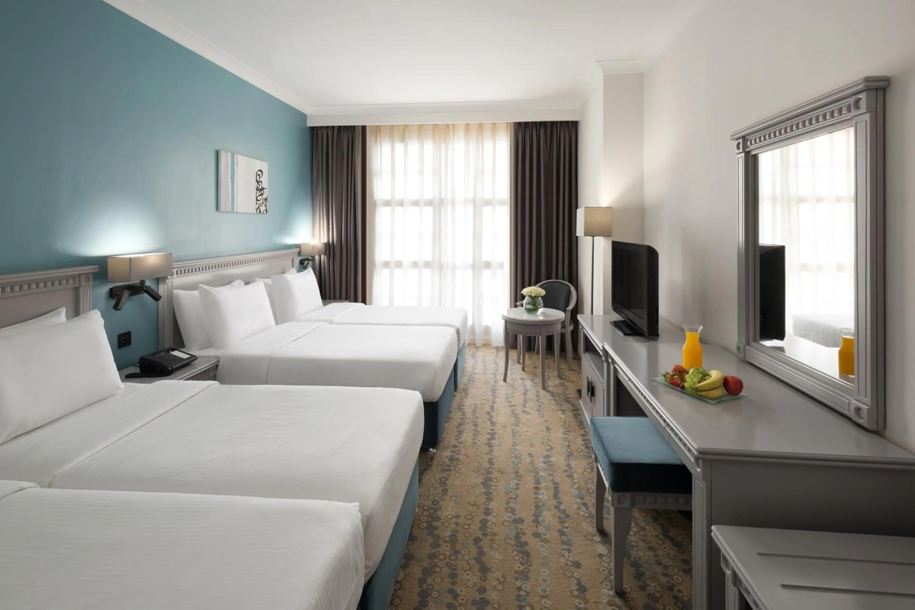 Classic Quadruple Room in Anwar Al Madinah Mövenpick