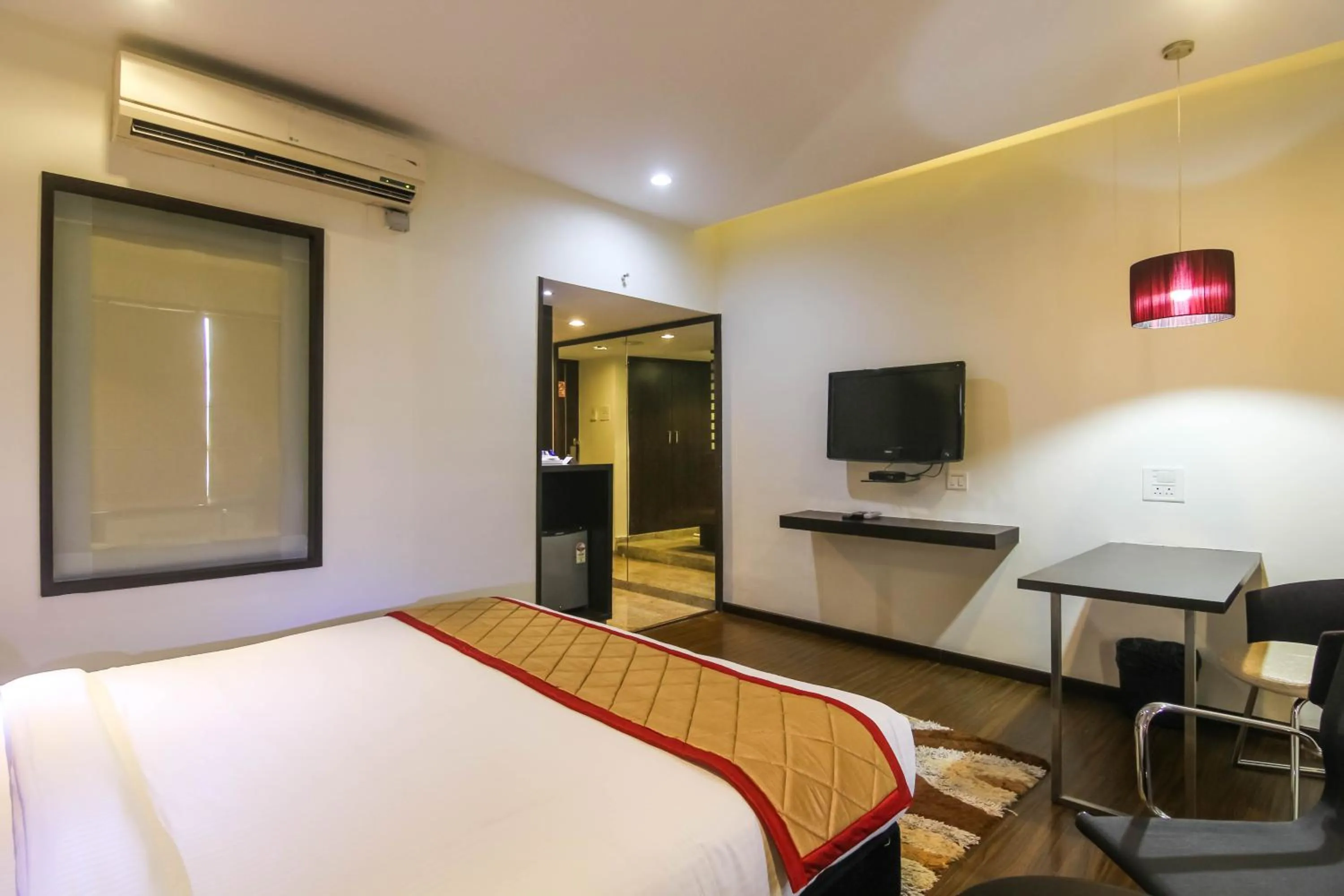Bedroom, Bed in Hotel LXIA Hinjewadi - Indian Nationals Only