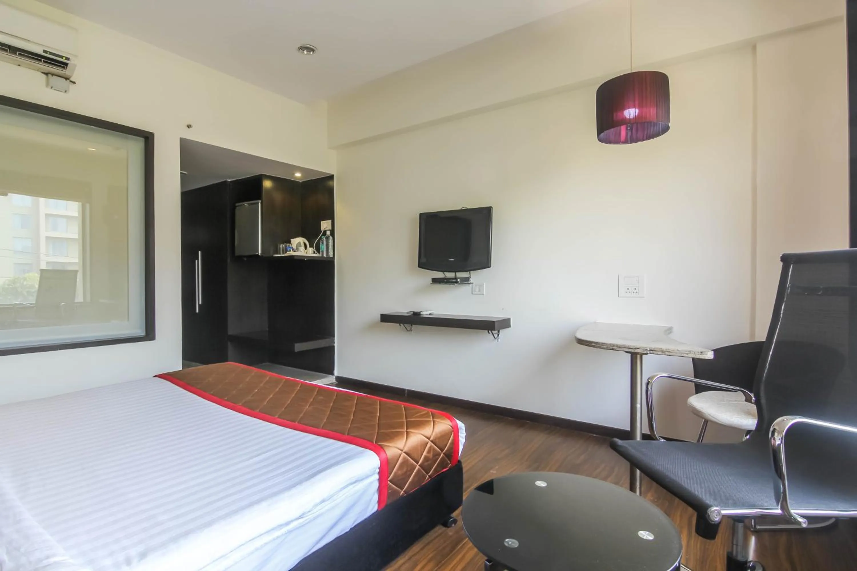Bedroom in Hotel LXIA Hinjewadi - Indian Nationals Only