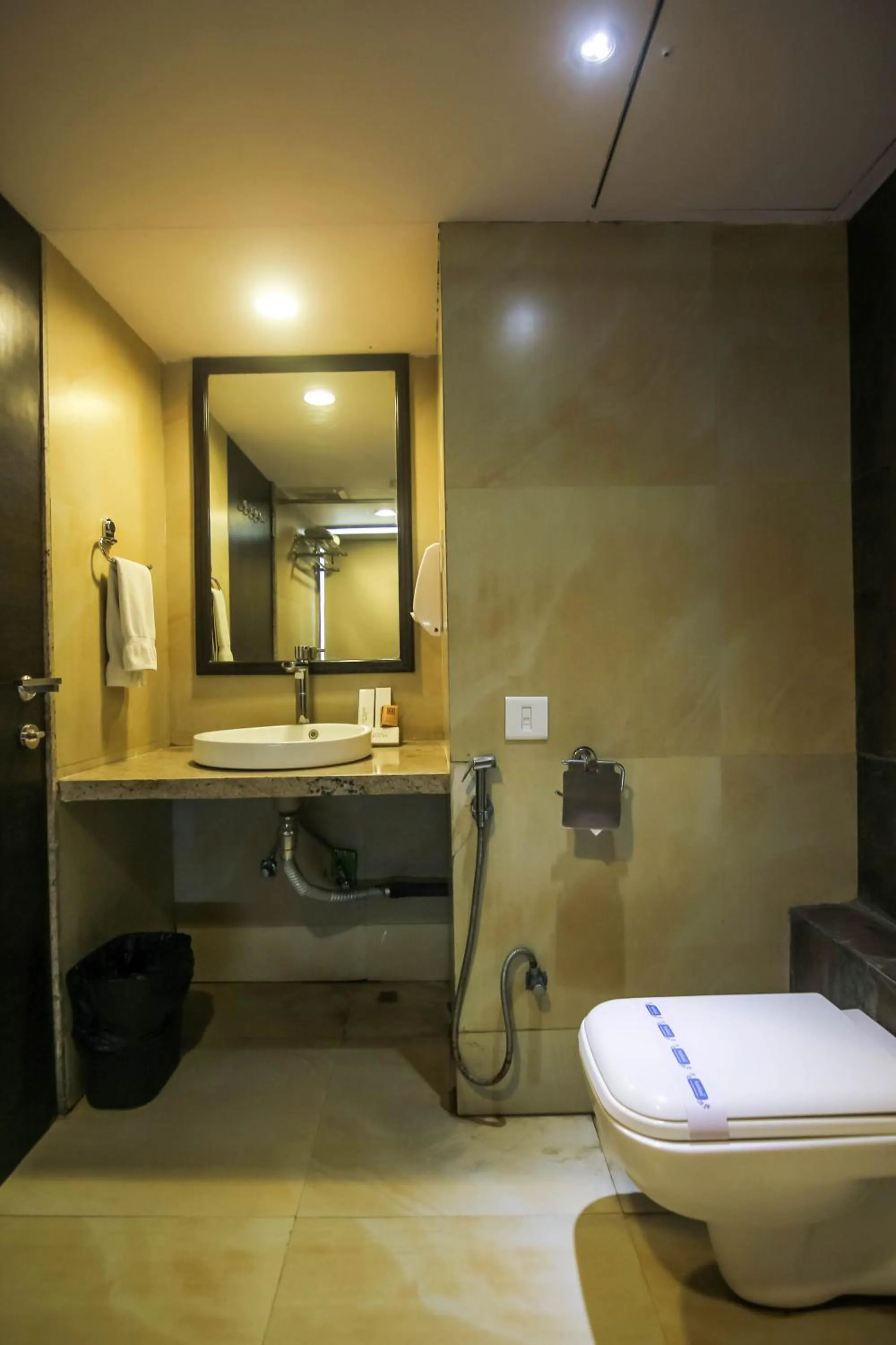 Bathroom in Hotel LXIA Hinjewadi - Indian Nationals Only