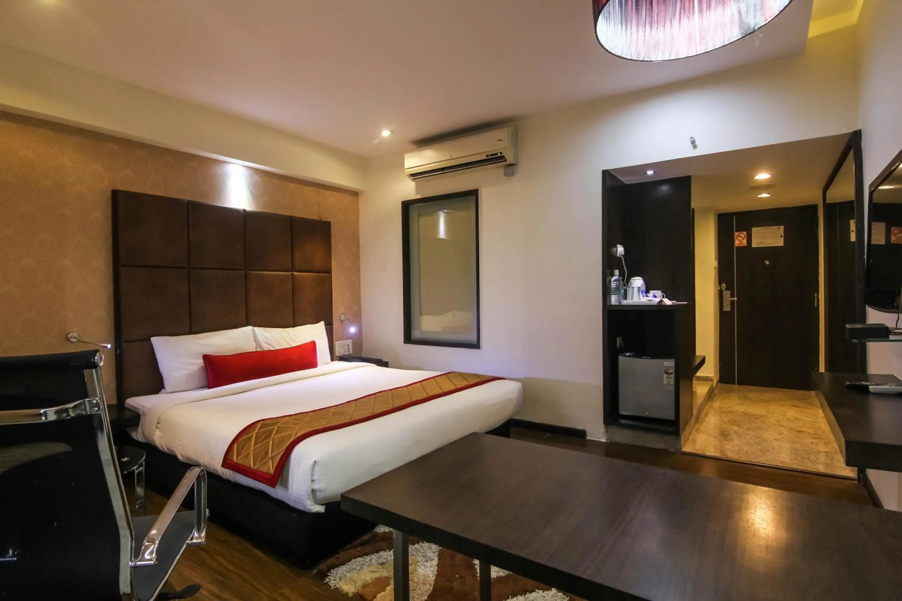 Bedroom, Bed in Hotel LXIA Hinjewadi - Indian Nationals Only
