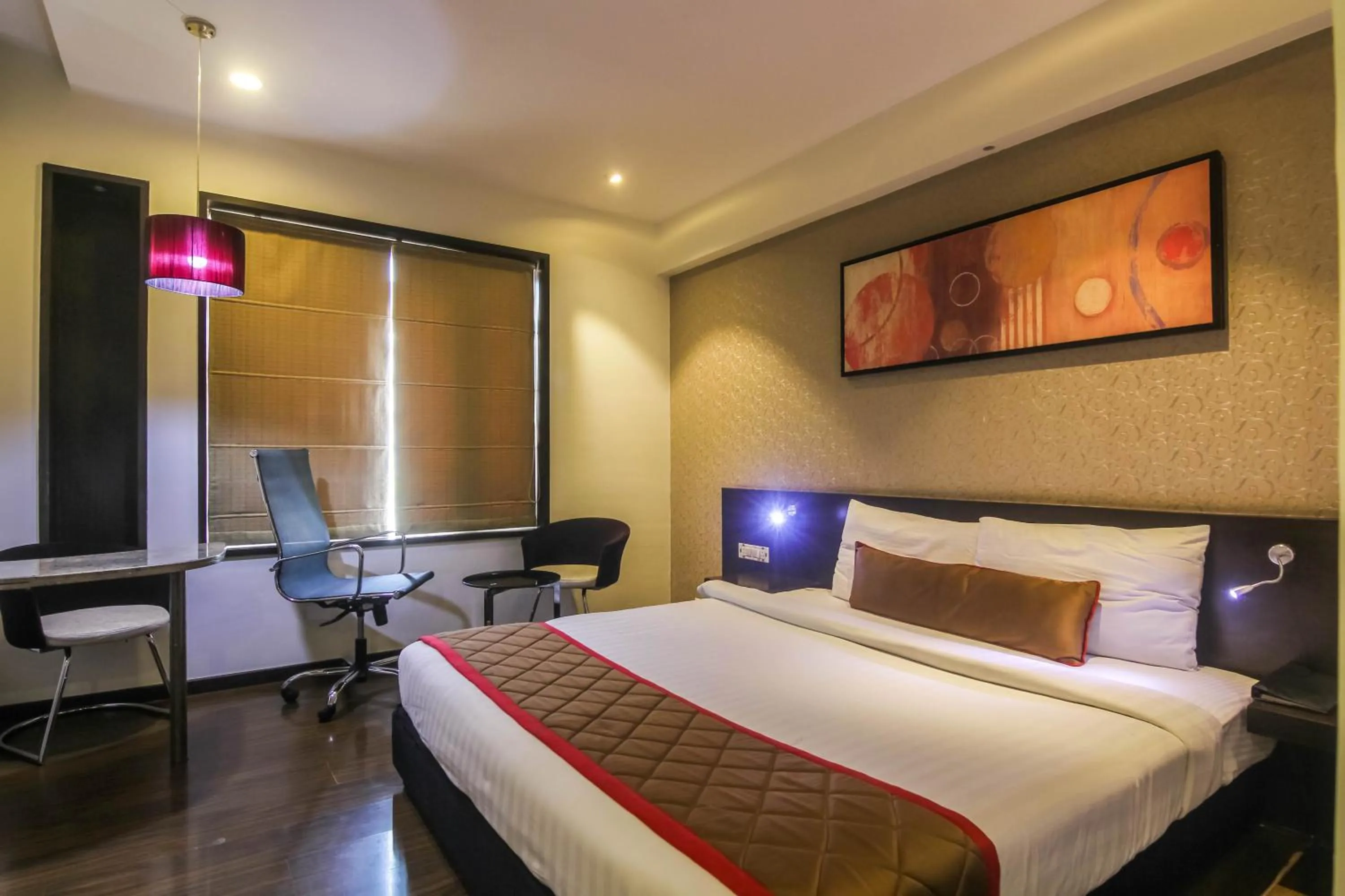 Bedroom, Bed in Hotel LXIA Hinjewadi - Indian Nationals Only