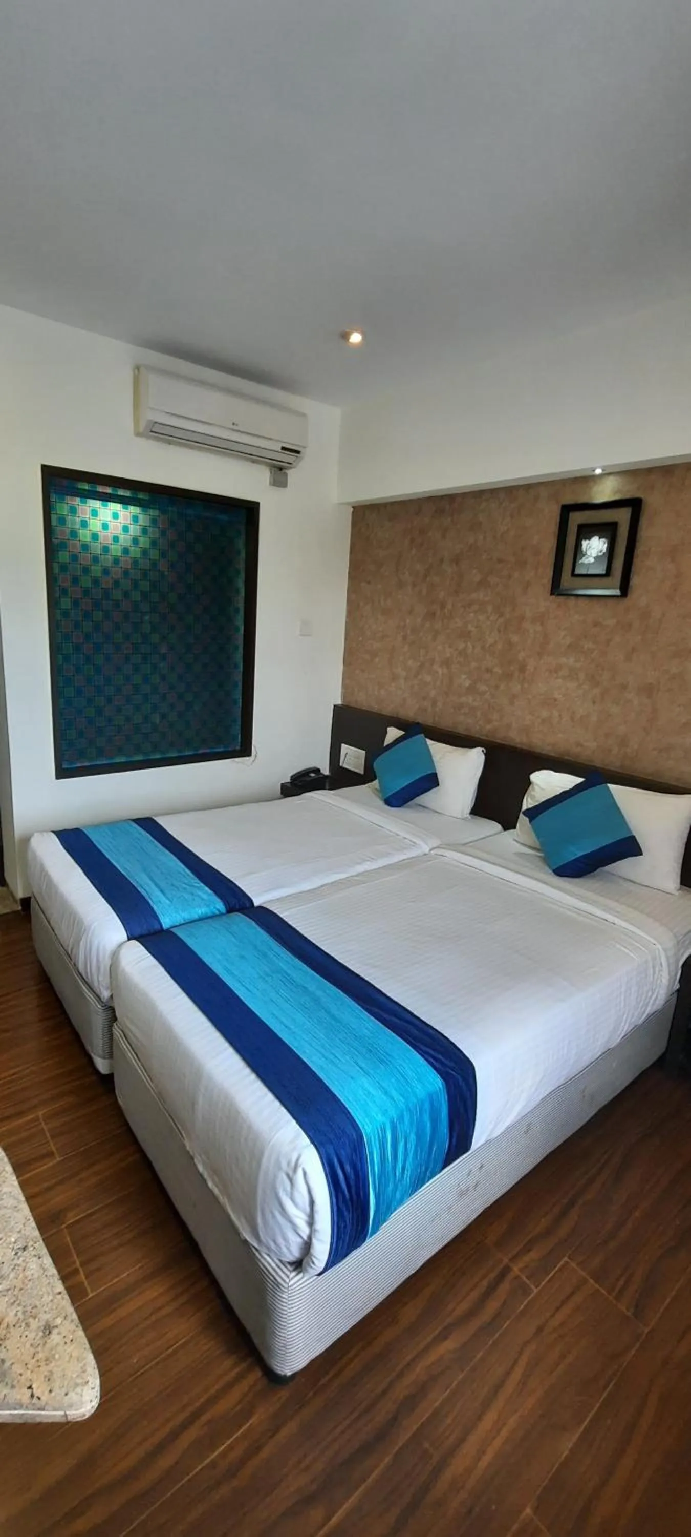 Bedroom, Bed in Hotel LXIA Hinjewadi - Indian Nationals Only