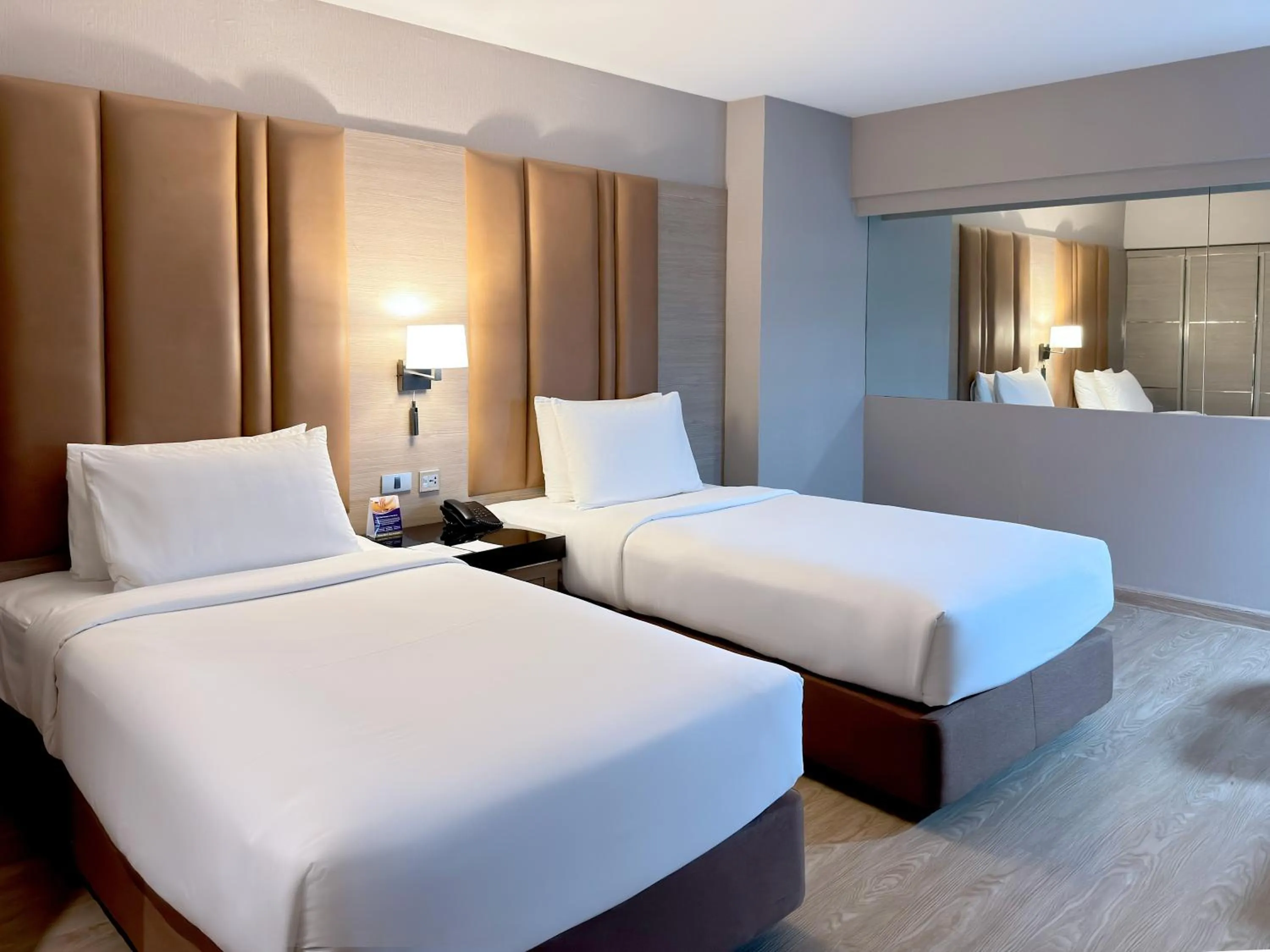 Bed in Ramada Sukhumvit Soi Eleven