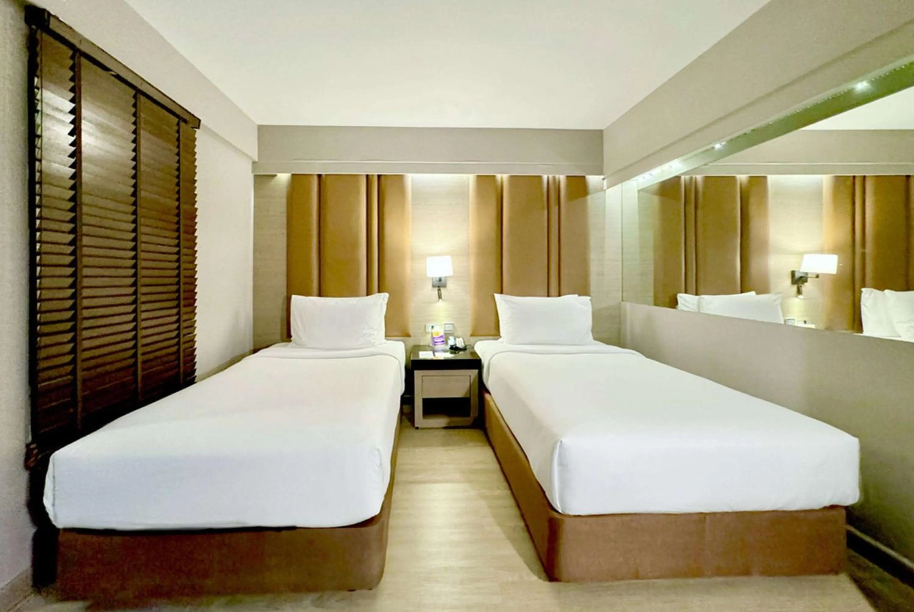 Photo of the whole room, Bed in Ramada Sukhumvit Soi Eleven