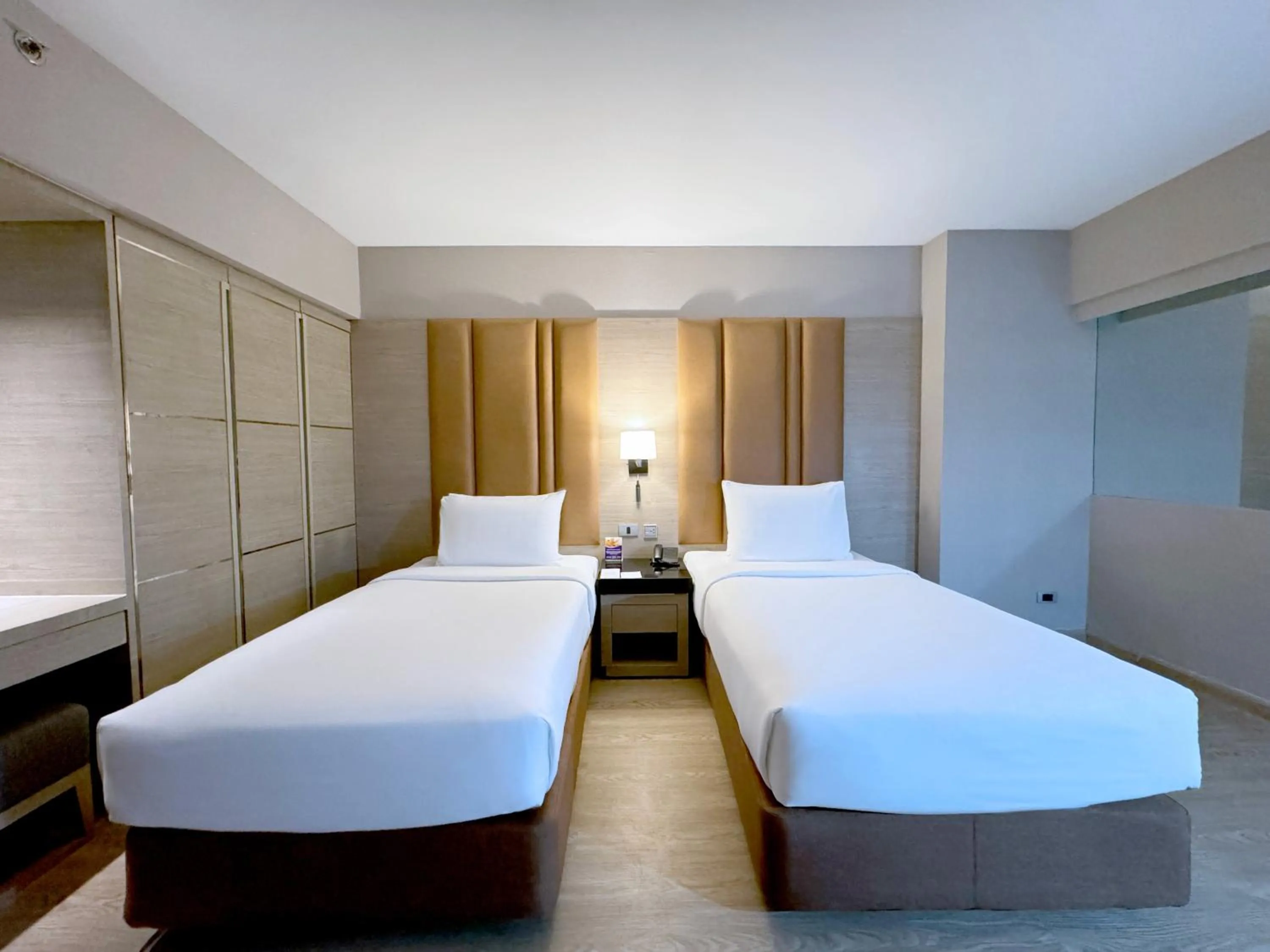 Bed in Ramada Sukhumvit Soi Eleven