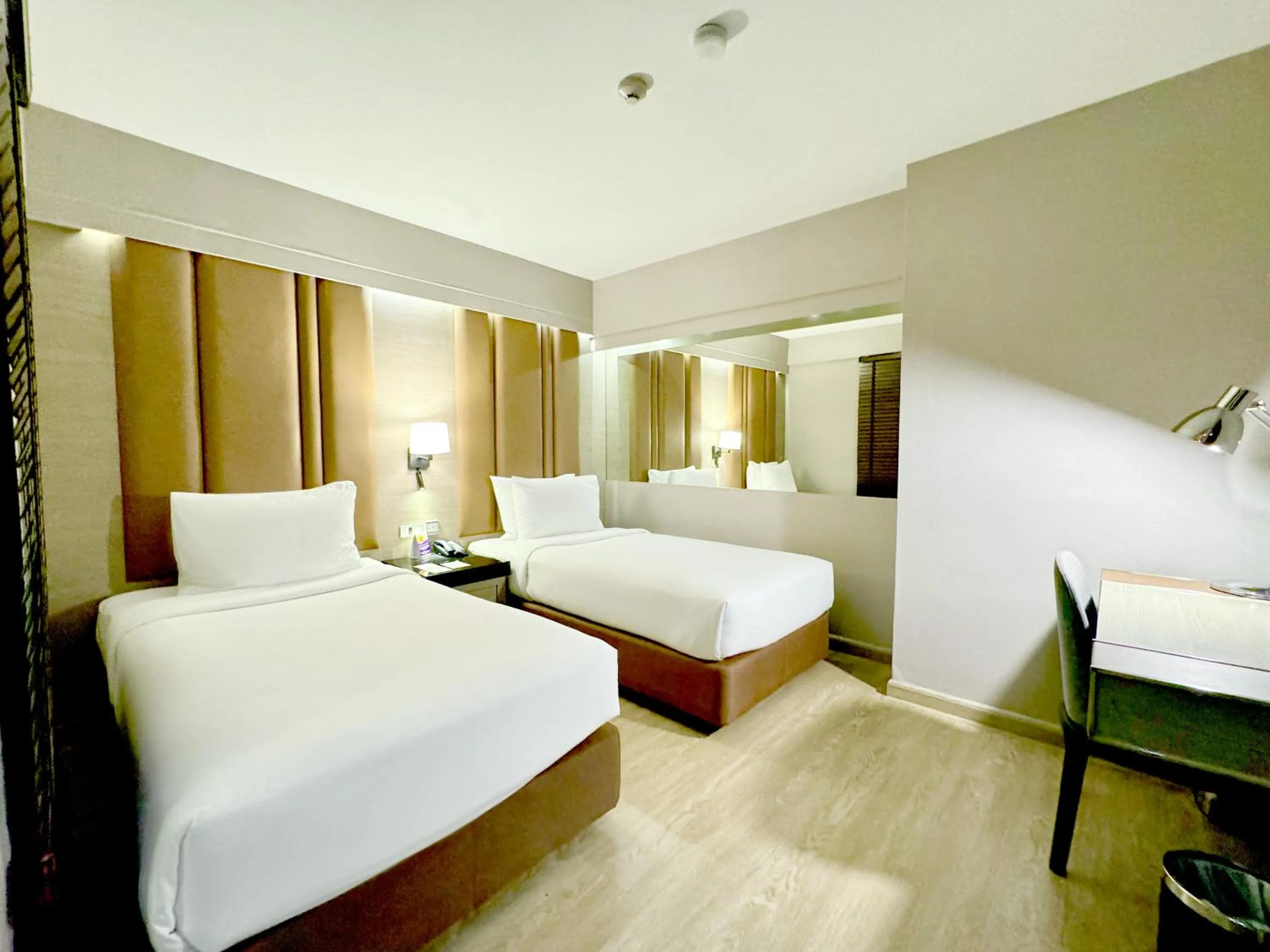 Bed in Ramada Sukhumvit Soi Eleven