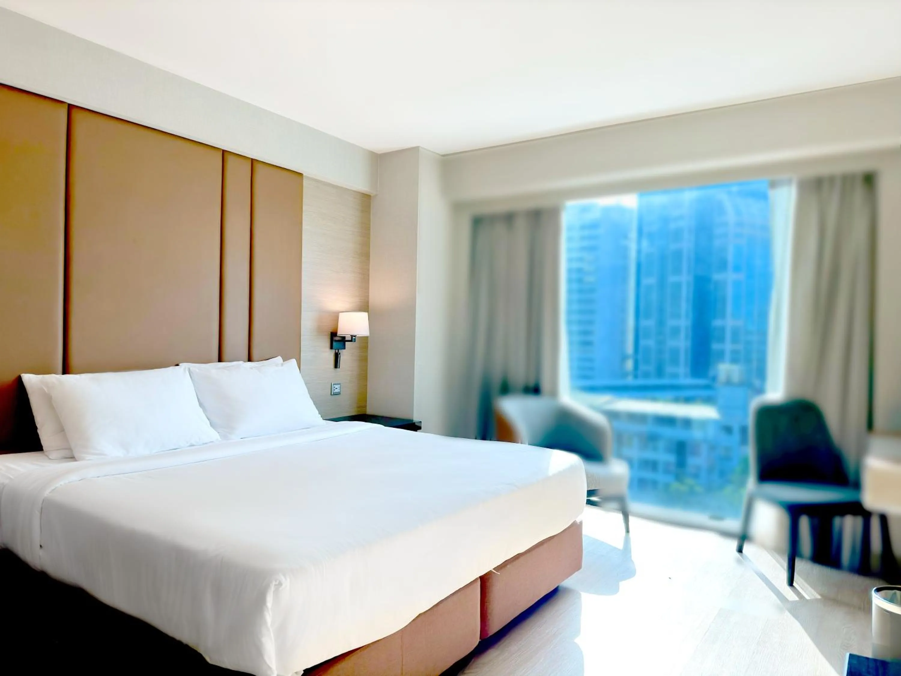 Bed in Ramada Sukhumvit Soi Eleven