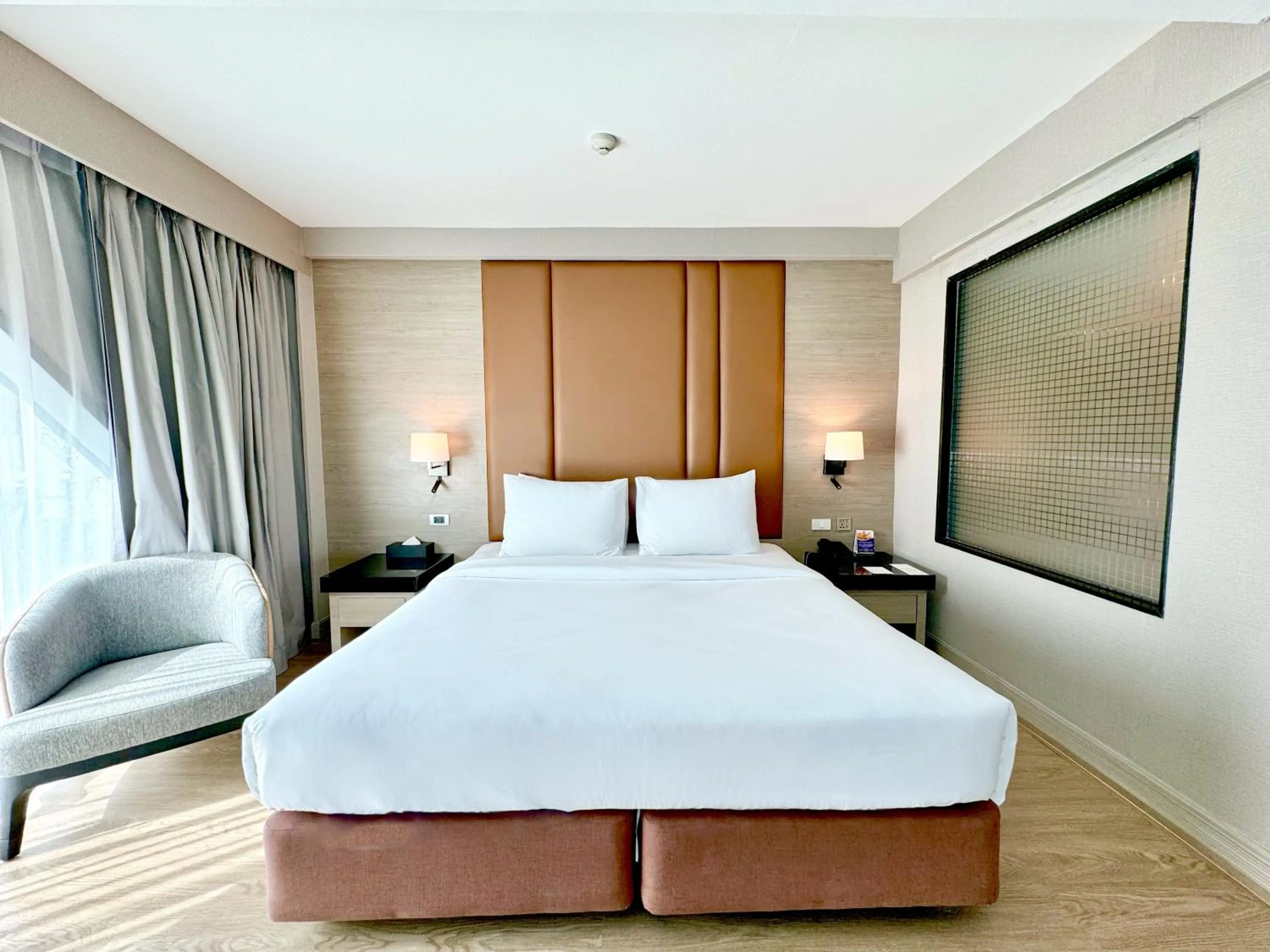 Bed in Ramada Sukhumvit Soi Eleven