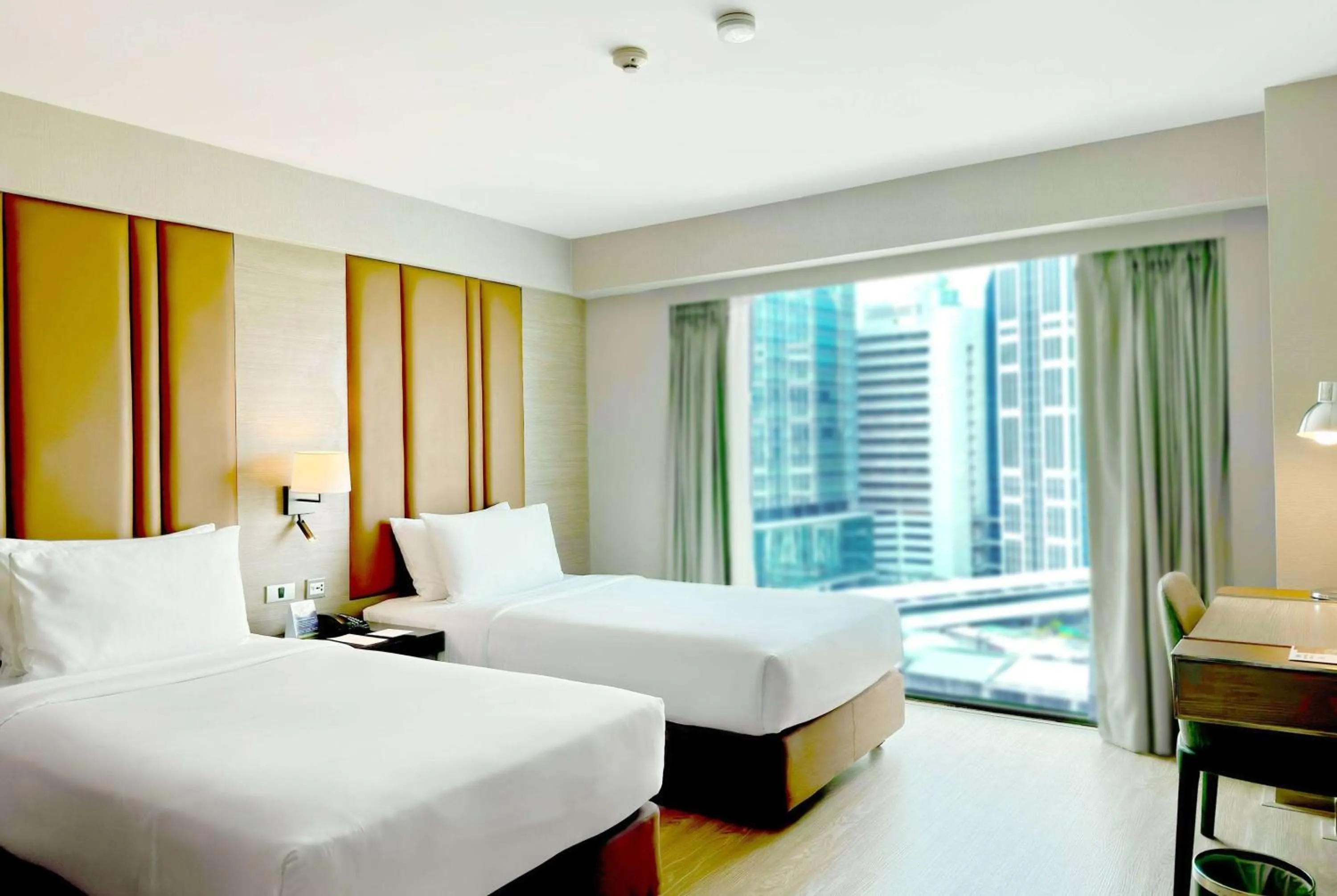 Photo of the whole room, Bed in Ramada Sukhumvit Soi Eleven