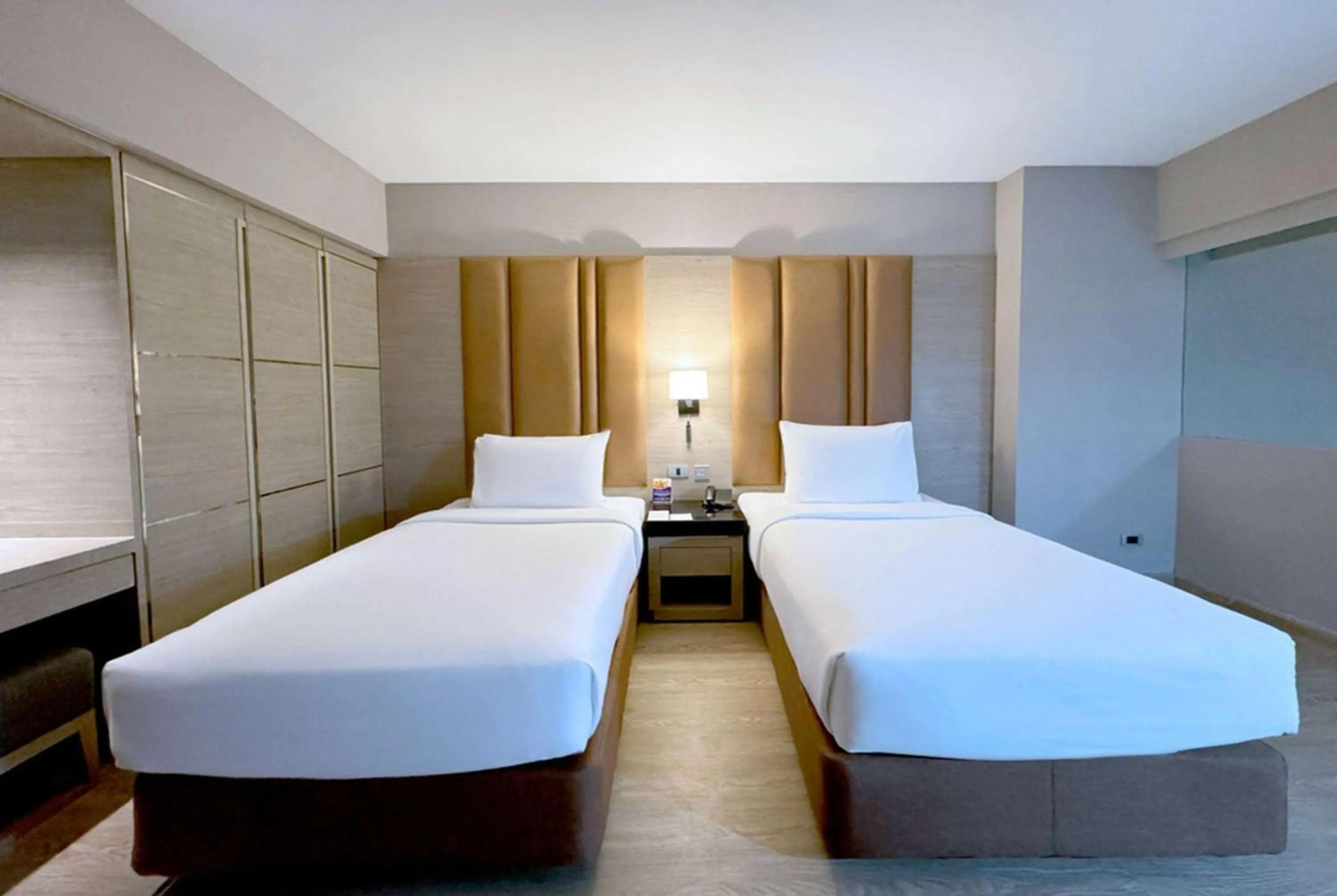 Photo of the whole room, Bed in Ramada Sukhumvit Soi Eleven