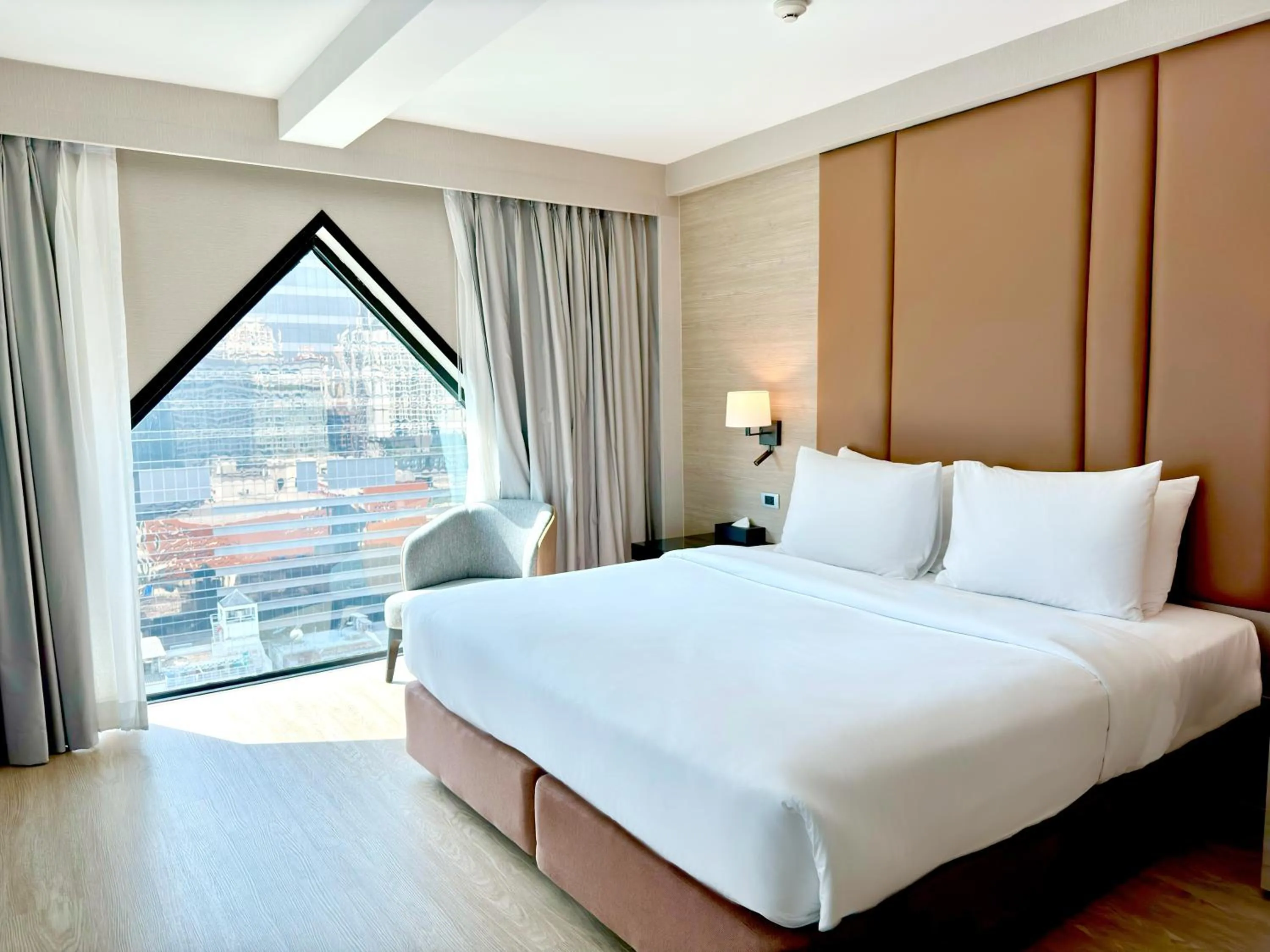 Bed in Ramada Sukhumvit Soi Eleven