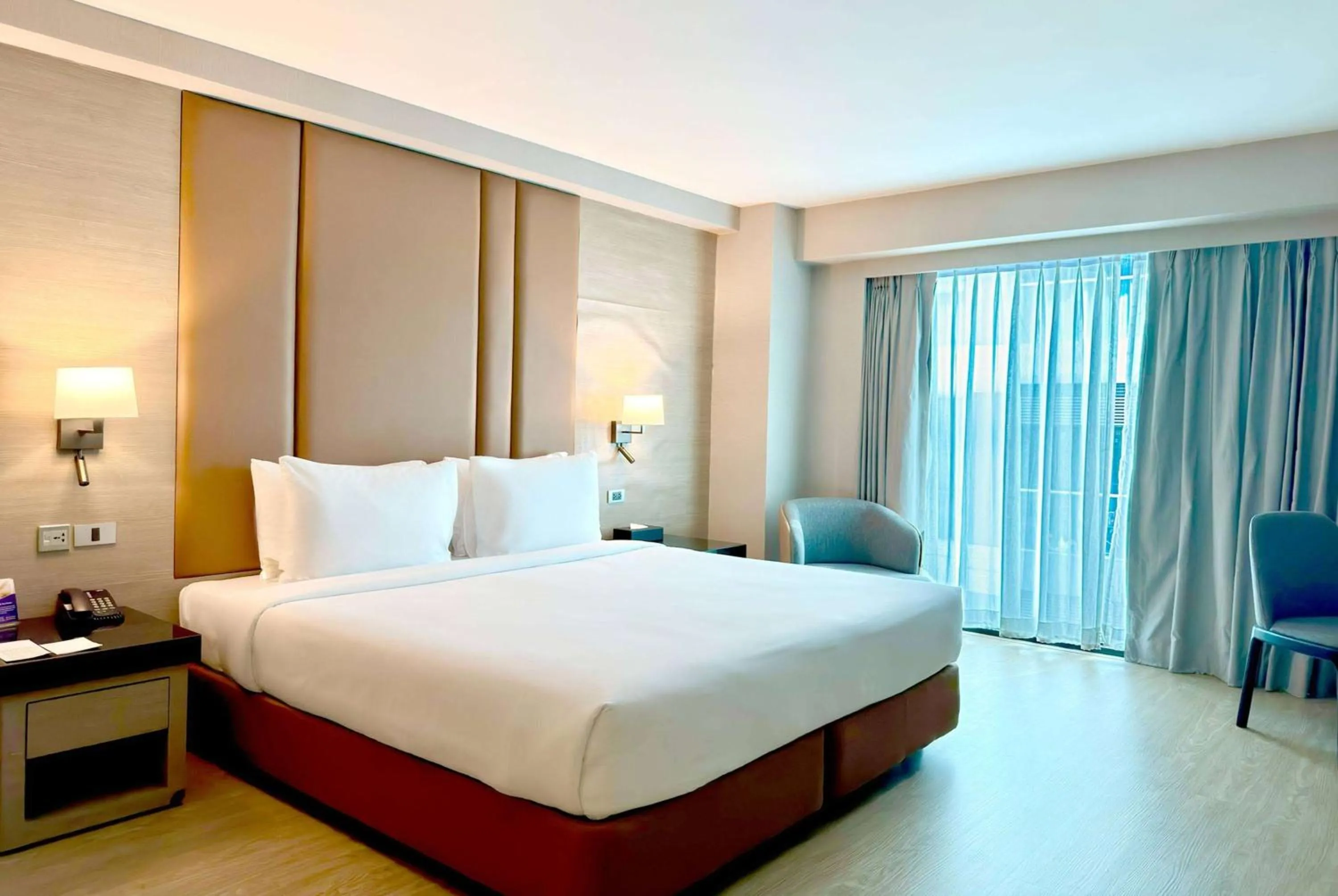 Photo of the whole room, Bed in Ramada Sukhumvit Soi Eleven
