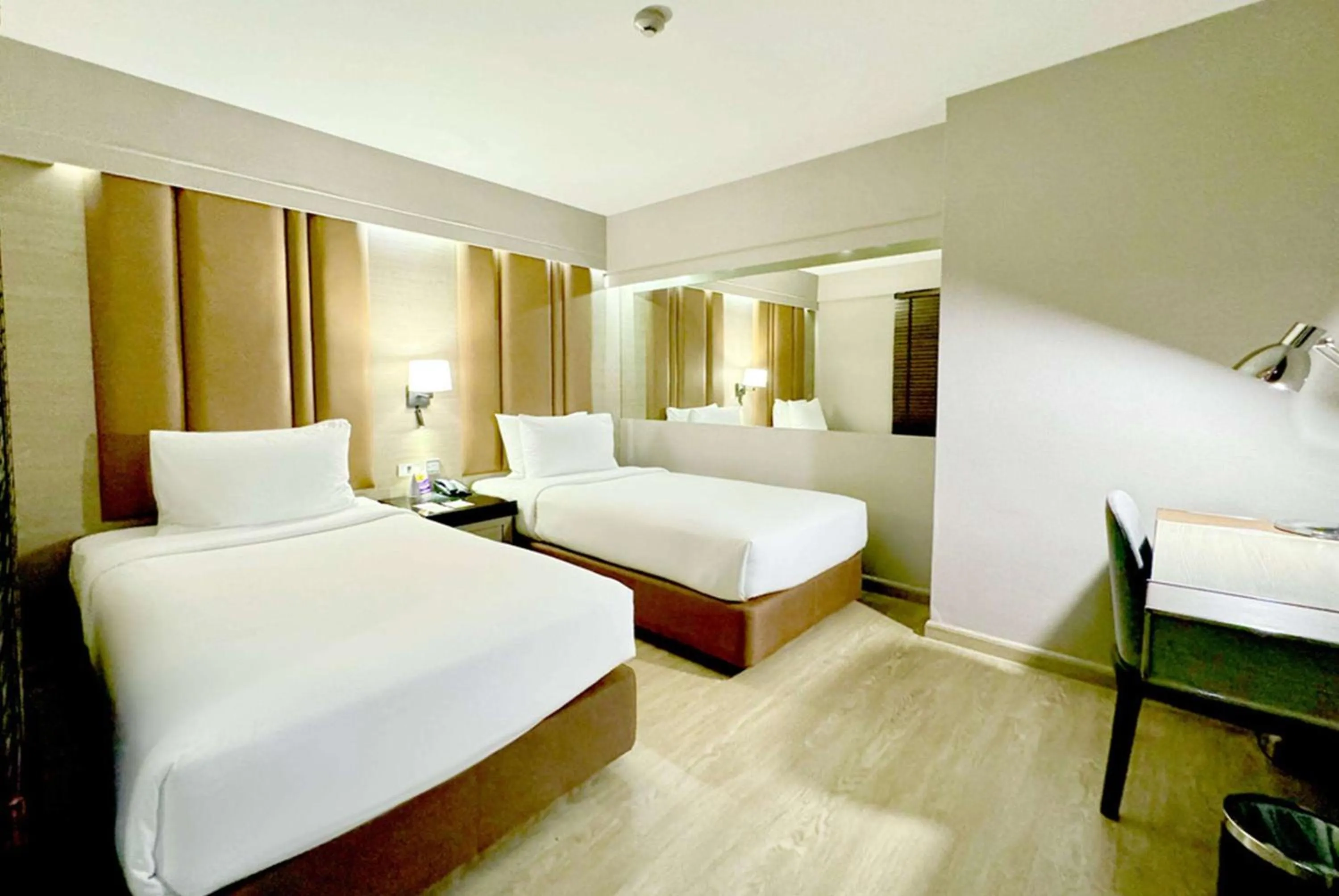 Photo of the whole room, Bed in Ramada Sukhumvit Soi Eleven