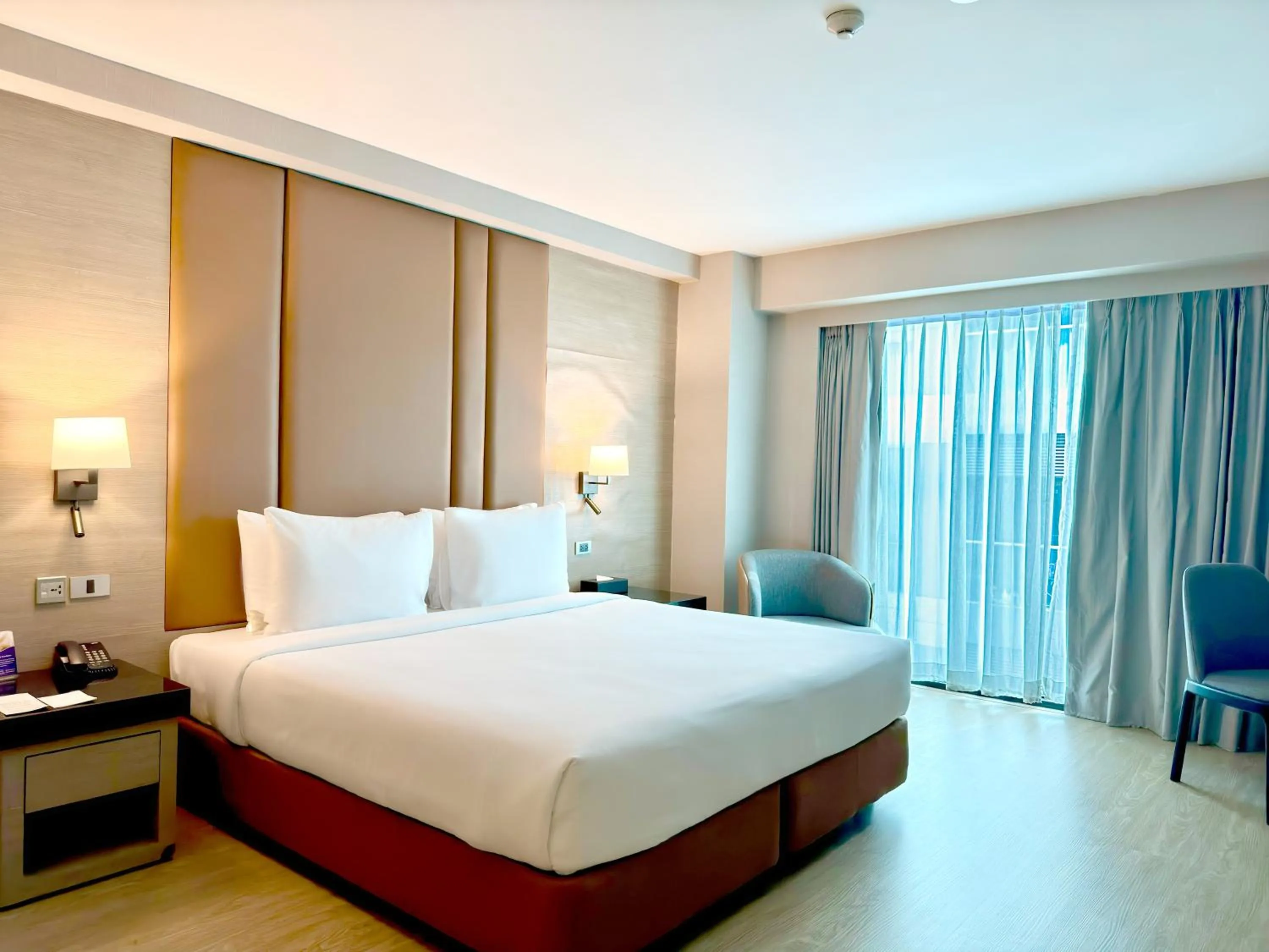 Bed in Ramada Sukhumvit Soi Eleven