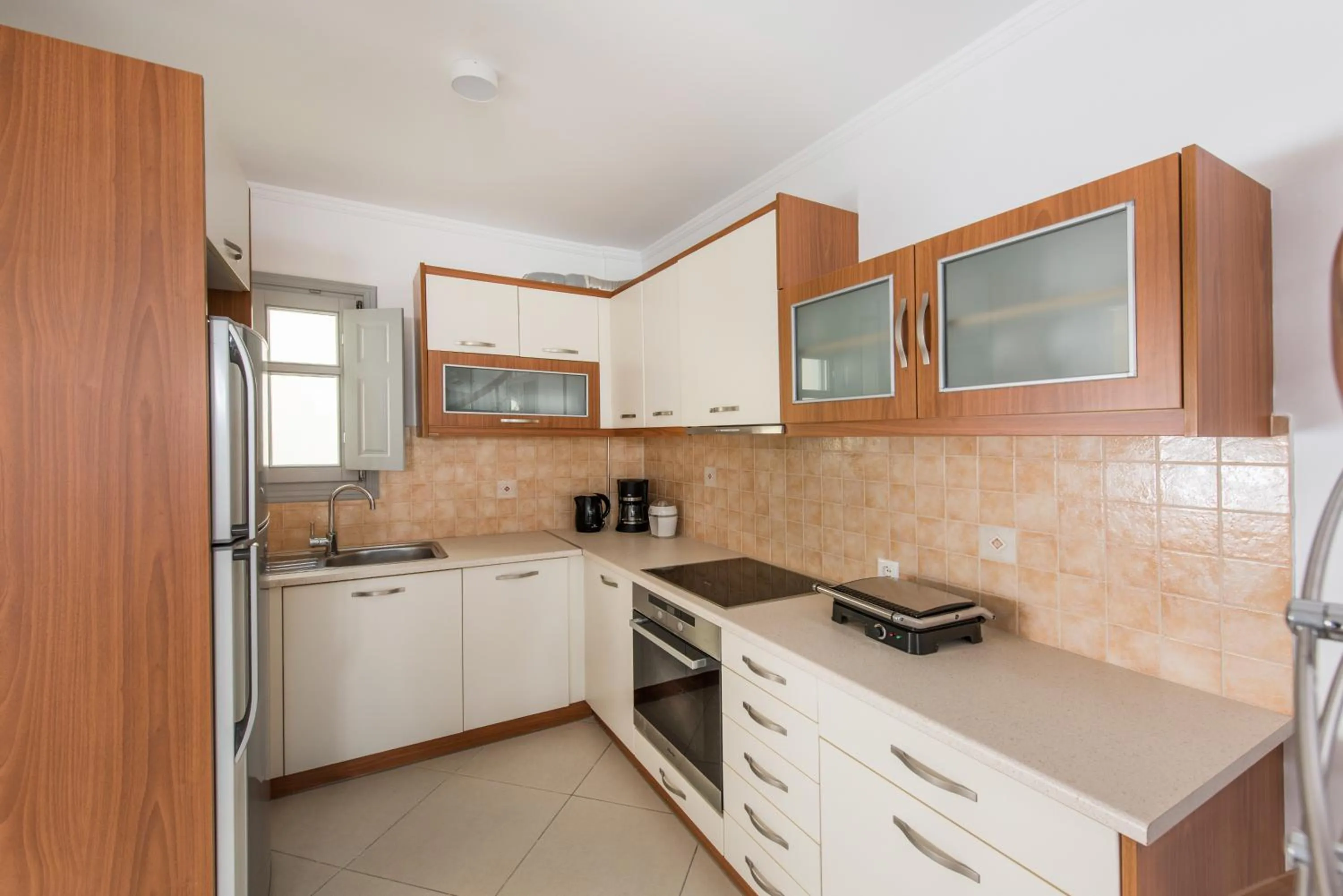 Kitchen or kitchenette in Secret Earth Villas - Santorini