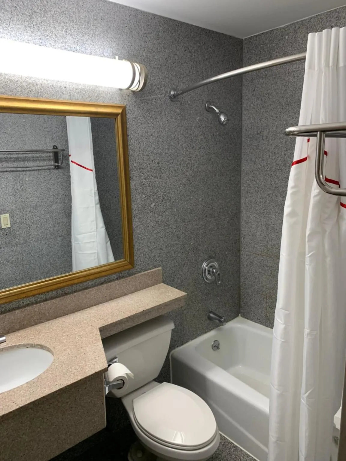 Bathroom in Days Inn by Wyndham Long Island/Copiague
