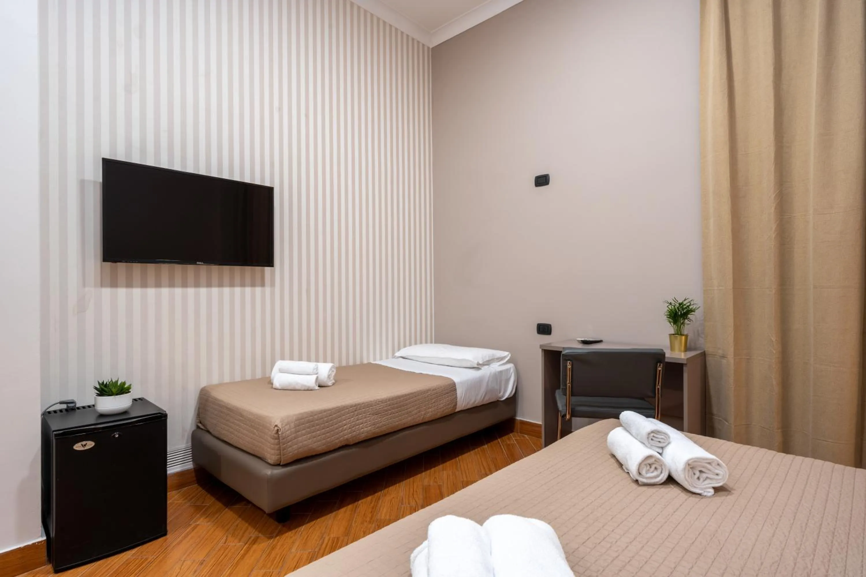 Bed in Hotel Diamond