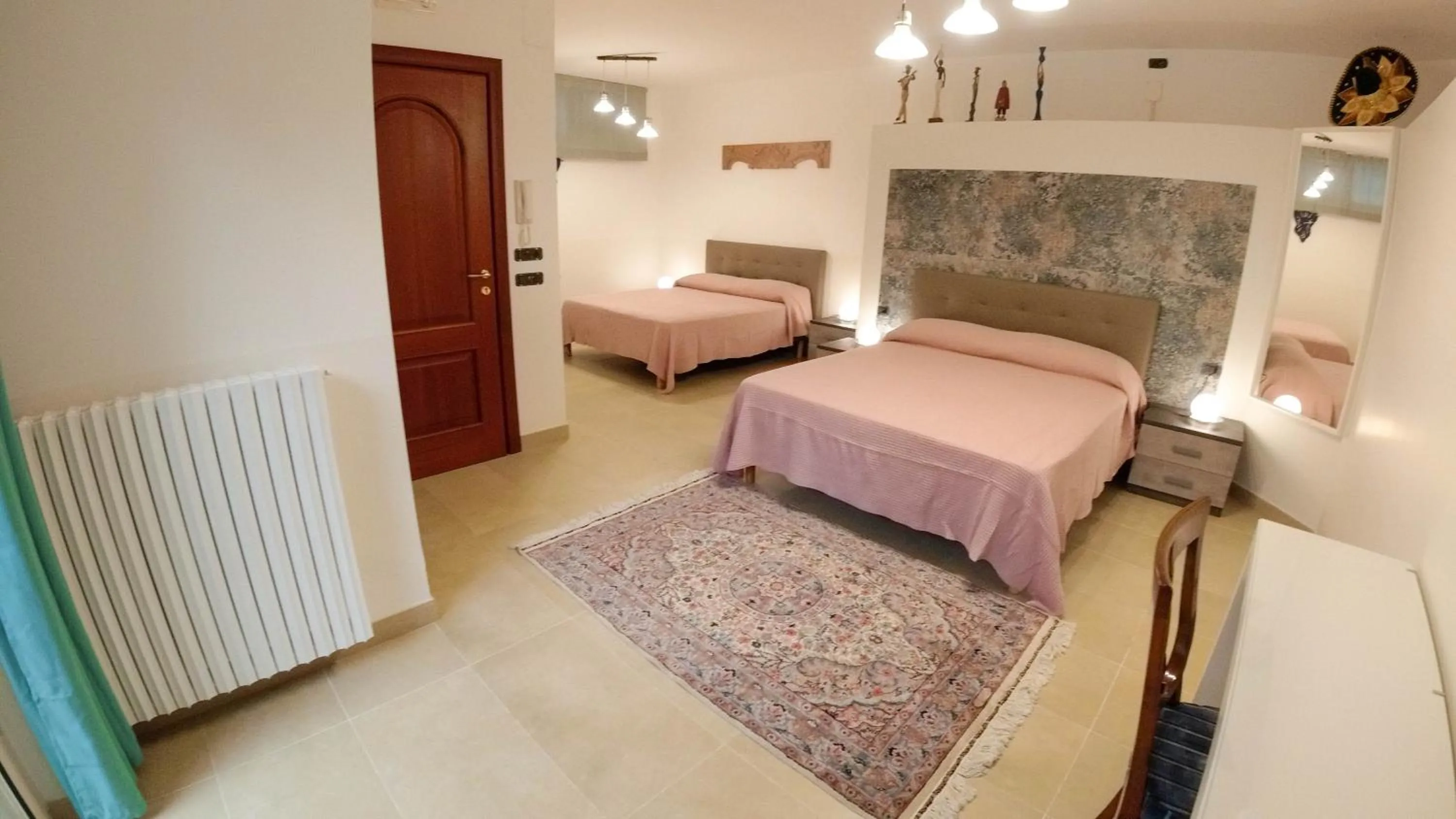 Bed in Il Piccolo Hotel