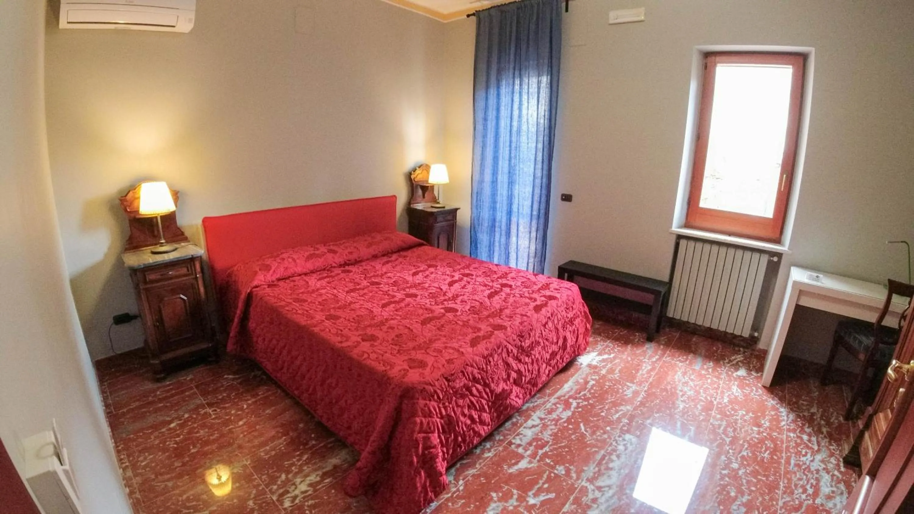 Bed in Il Piccolo Hotel