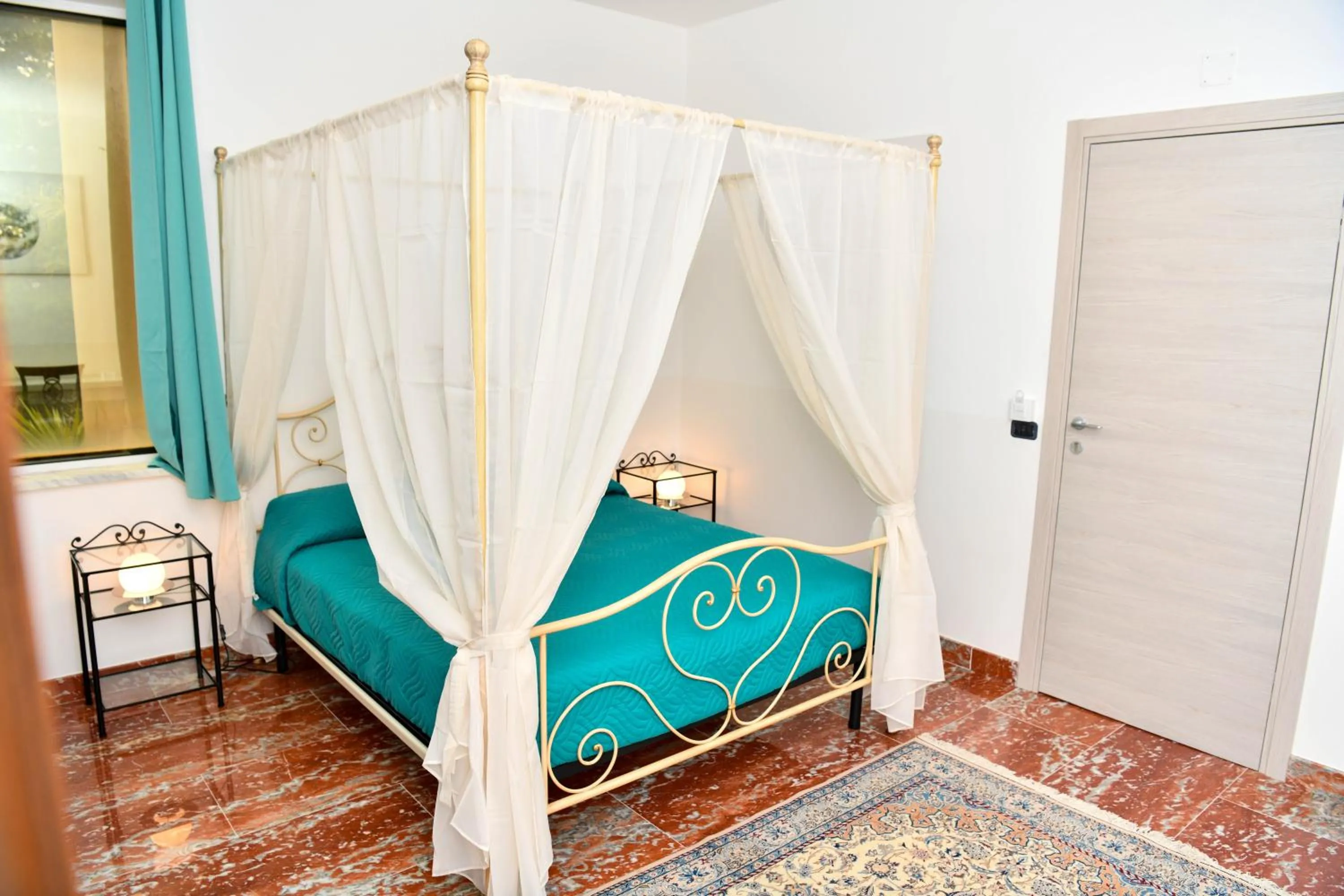 Bed in Il Piccolo Hotel