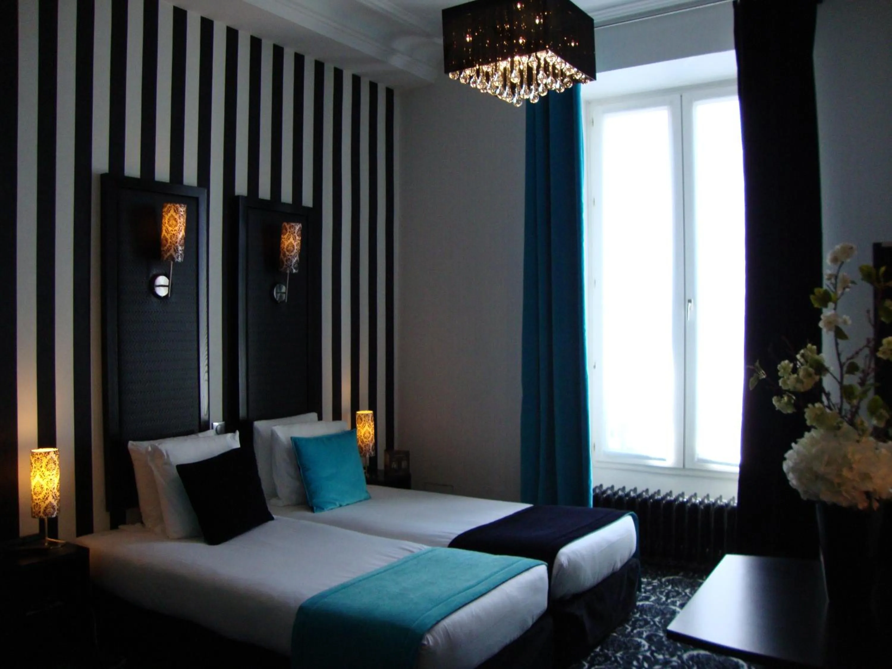 Bed in Hotel Peyris Opera