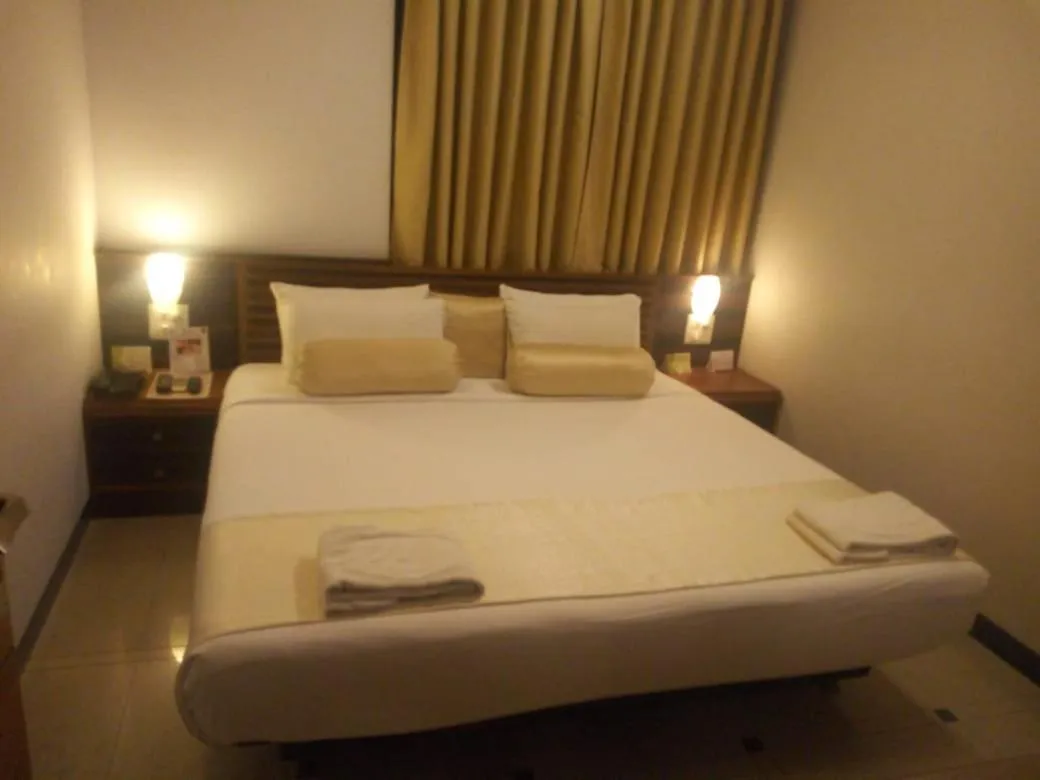 Bed in Goa Woodlands Hotel
