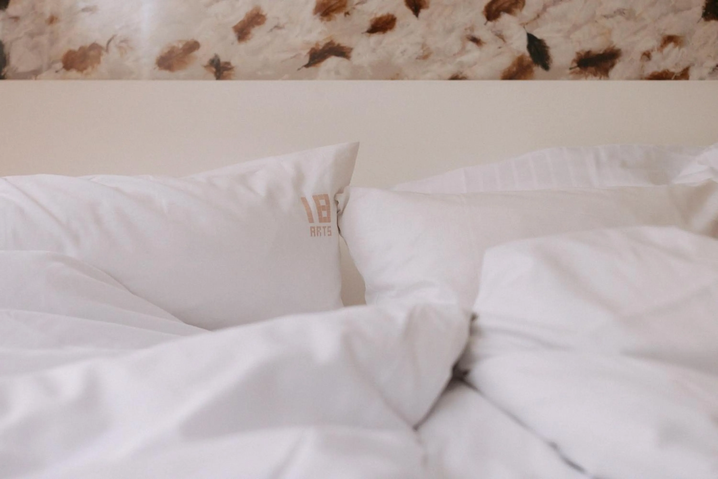 Bed in 18Arts Hotel - Living in a Gallery!