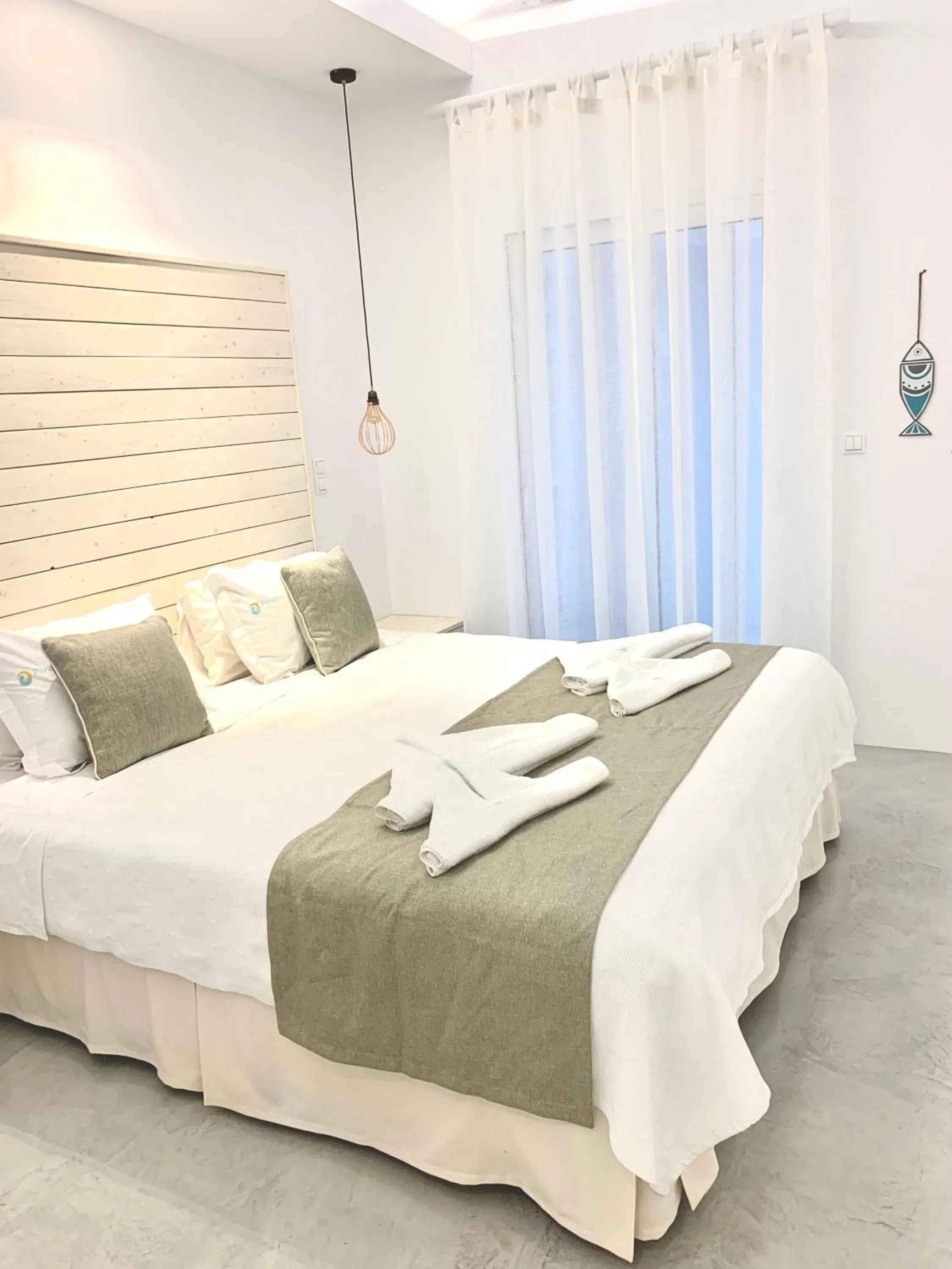 Bed in Paradise Design Apartments