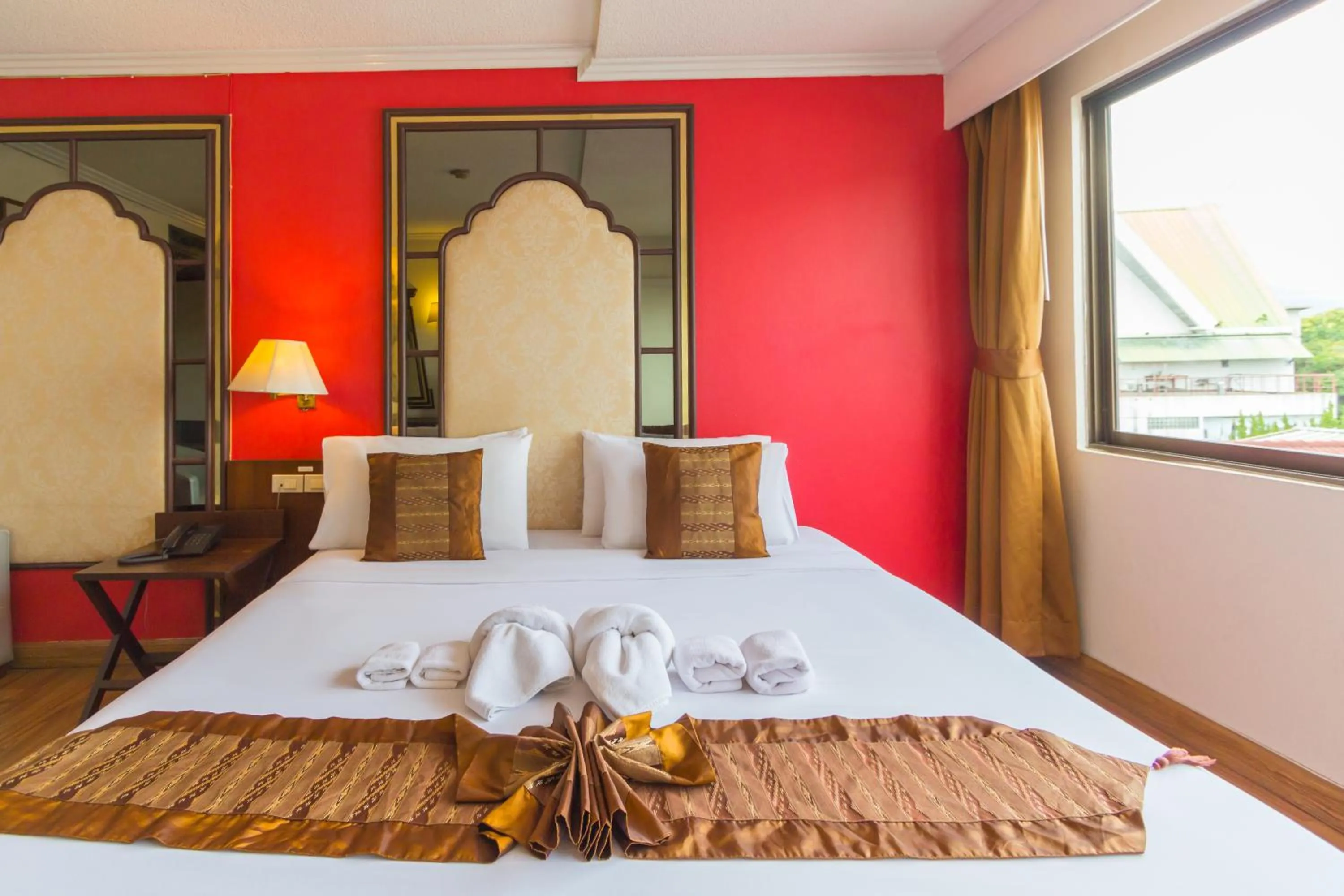 Bed in BP Chiangmai City Hotel